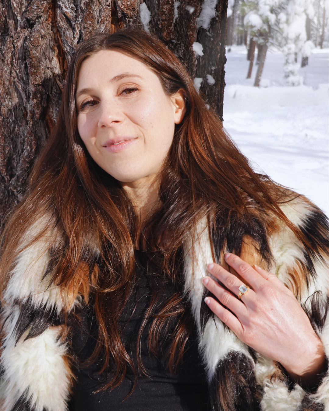 Emma Naomi in a snowy forest