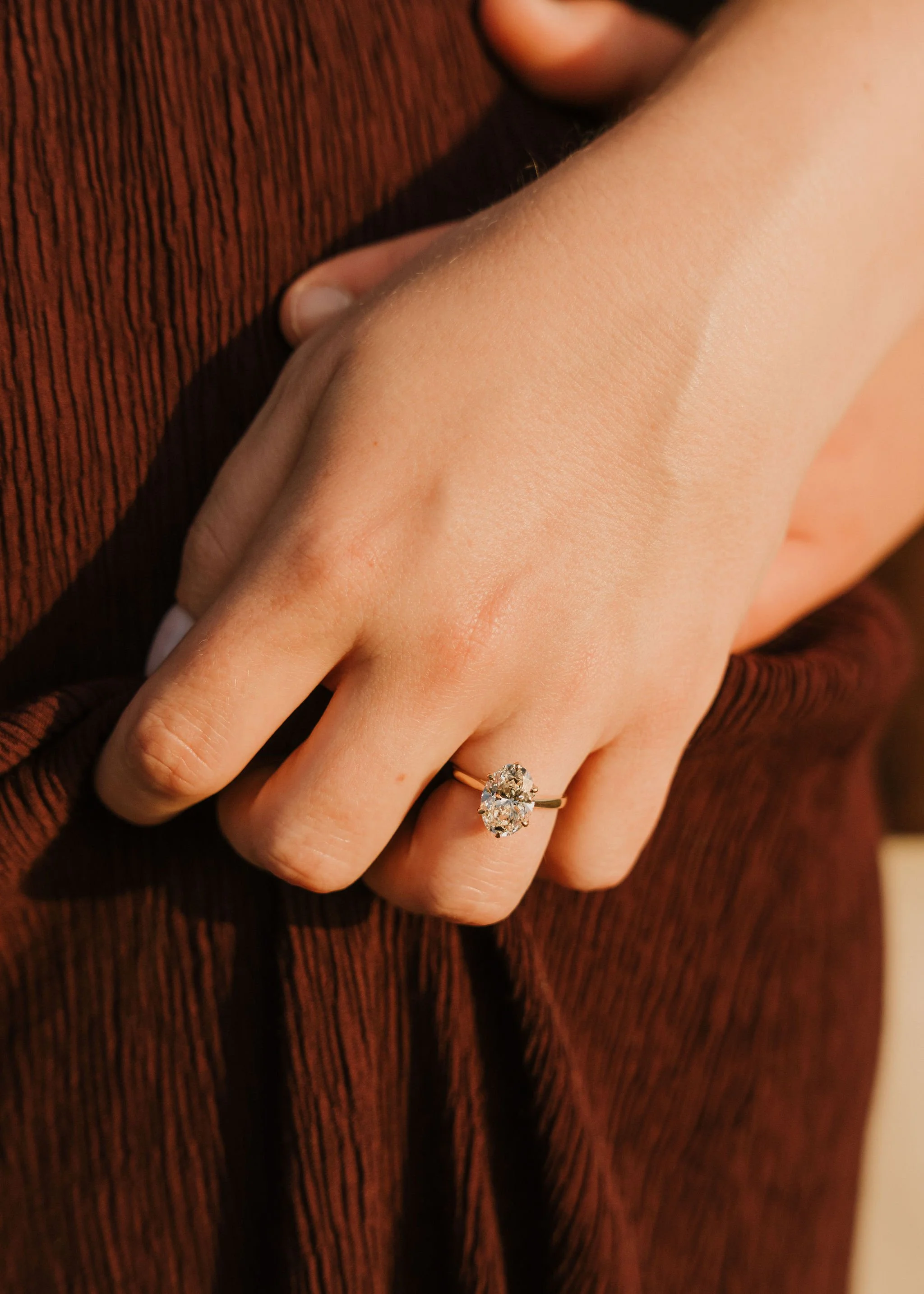Engagement ring close-up after a surprise proposal at Sunset Cliffs, San Diego proposal photographer