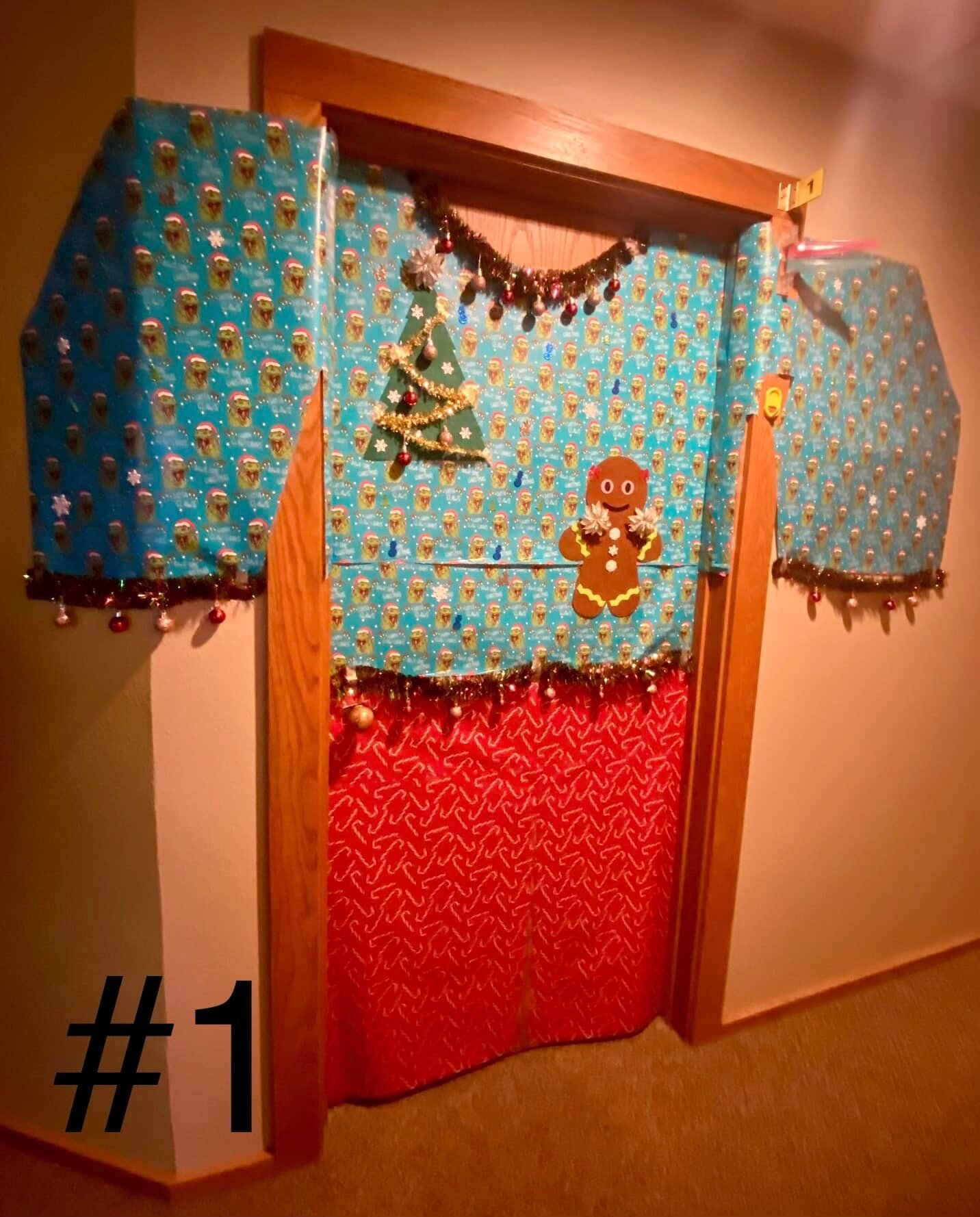 PSA: Vote in the comments. 
Your favorite chiropractic team has festively decorated the halls. Who did it best? 

Cast your vote today by commenting below with the picture number of your choice. The vote will continue through 12/31. The door decorato