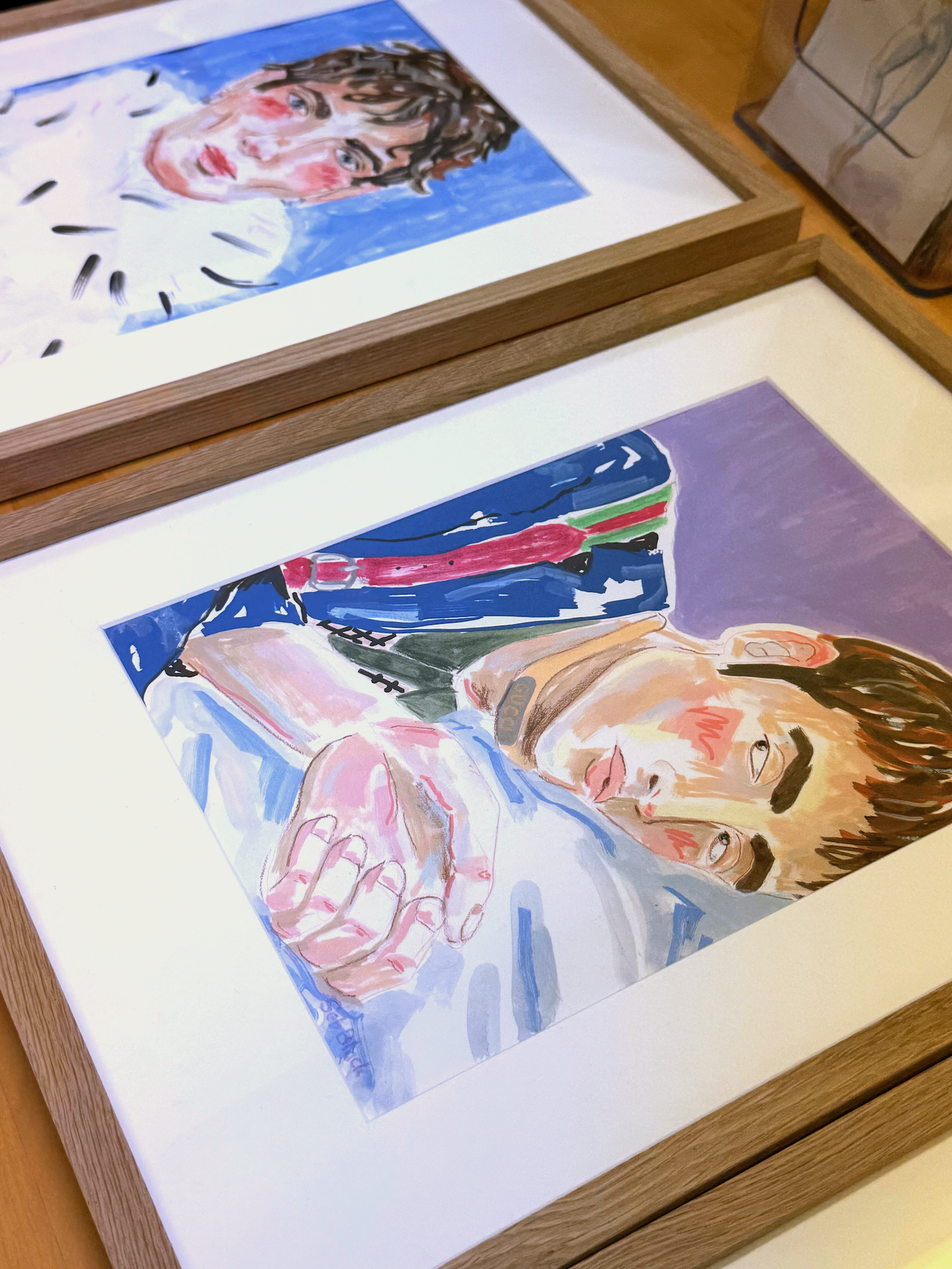 framed fashion illustrations by Seb Black for exhibition