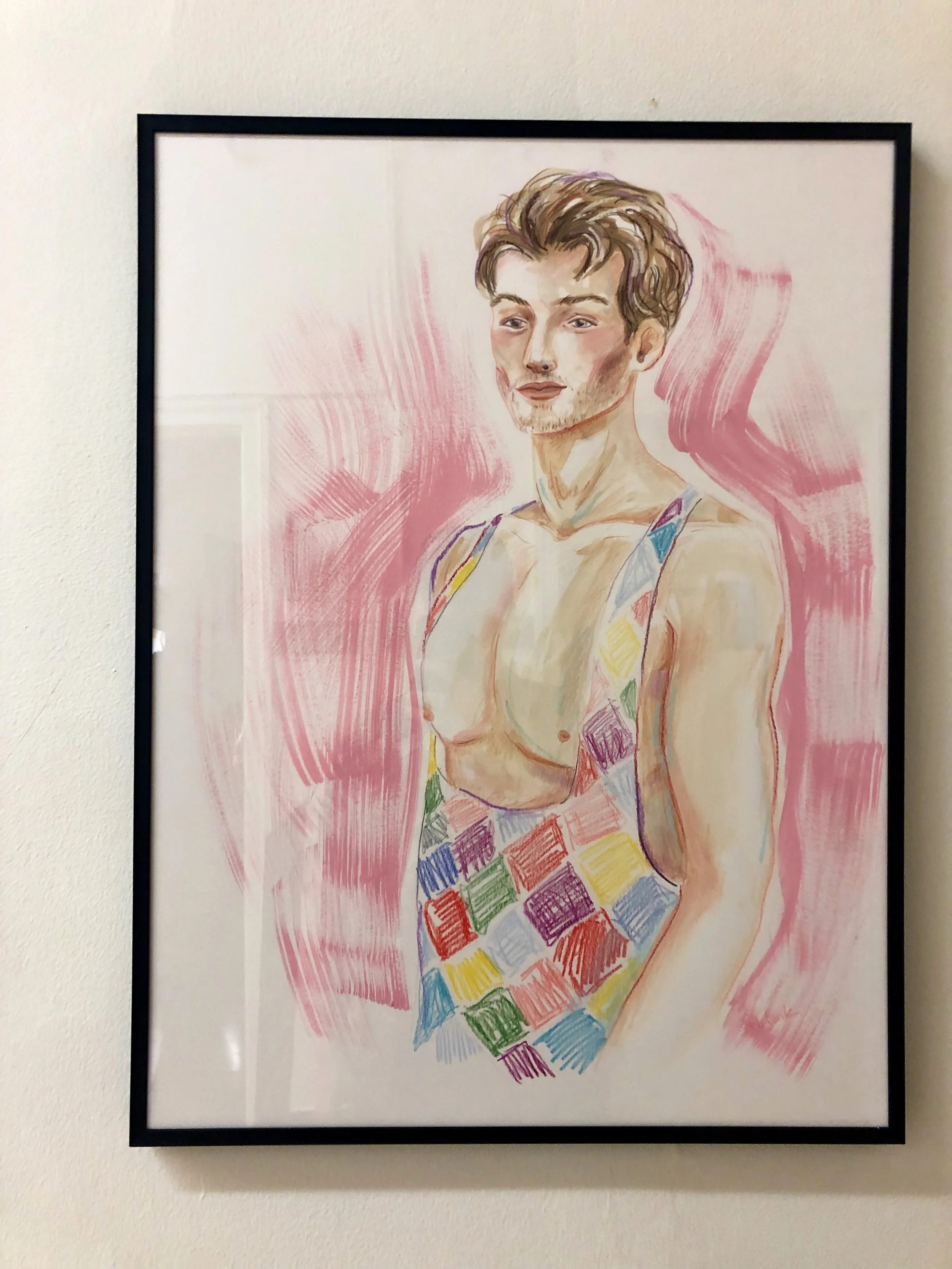 Seb Black fashion illustration in exhibition showing Harry Styles in a colourful jumpsuit.