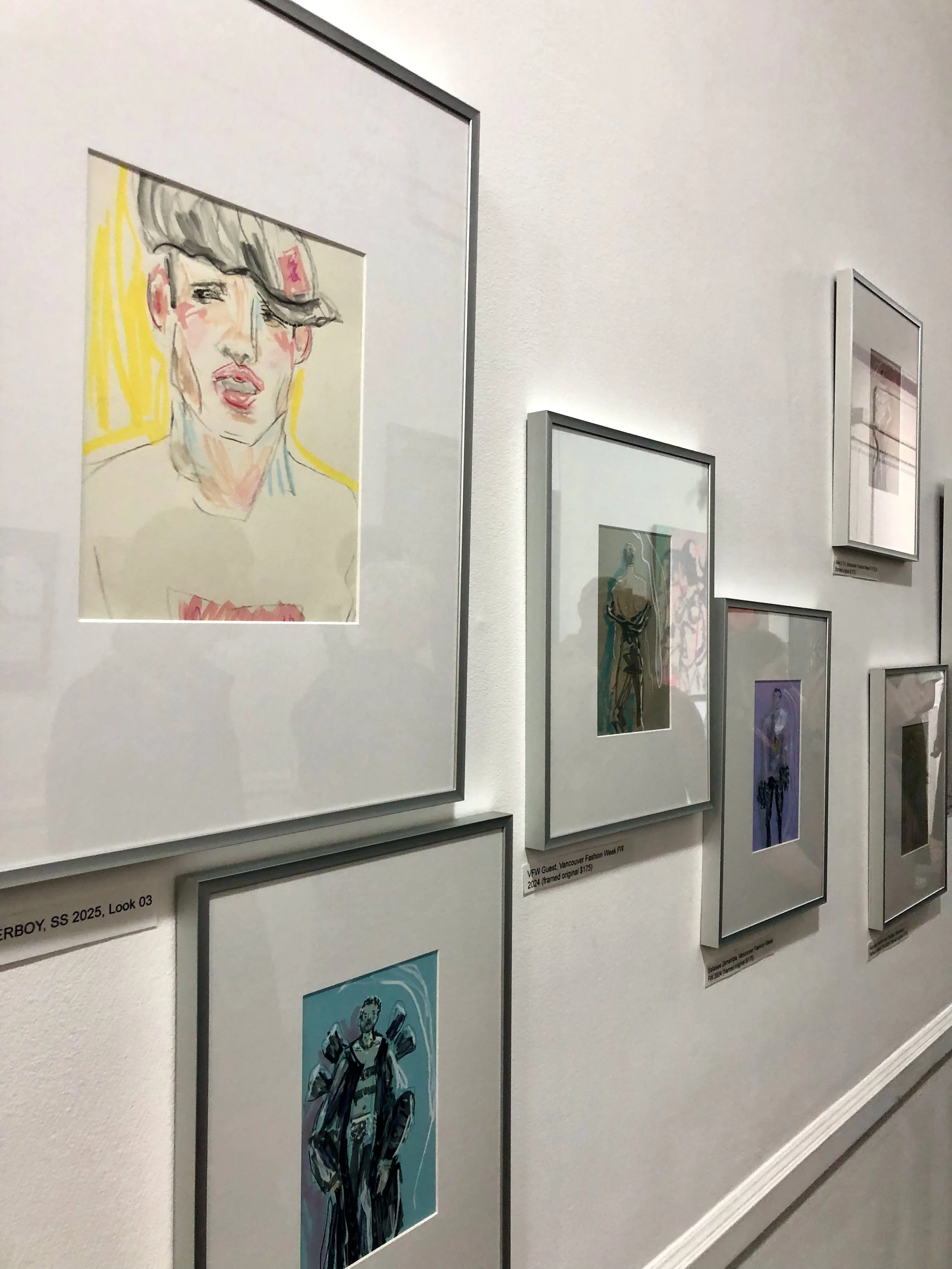 exhibition installation for Seb Black showing fashion runway illustrations