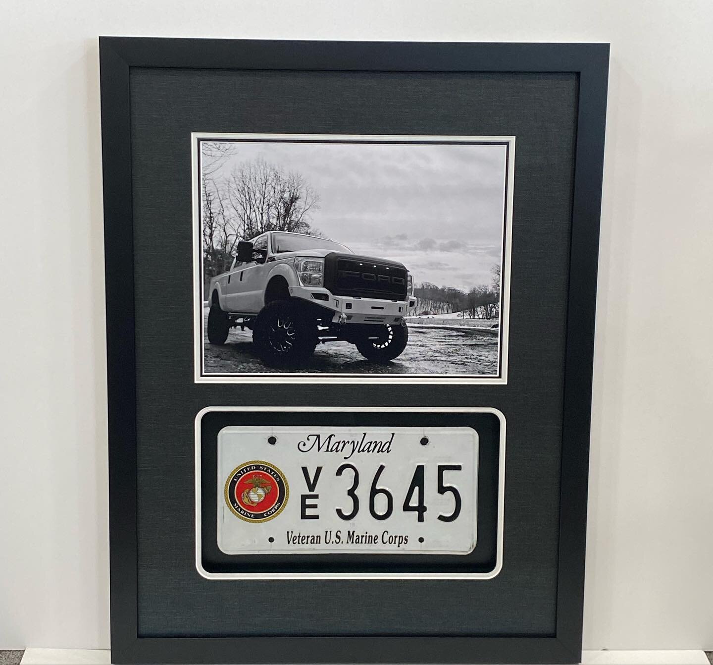 A boy and his truck! Textured black mat compliments the truck tires on this well captured photo. #capturingmemories #thanksforserving #smallbusiness #downtownbelair #imhereharford #harfordcounty #belairmd
