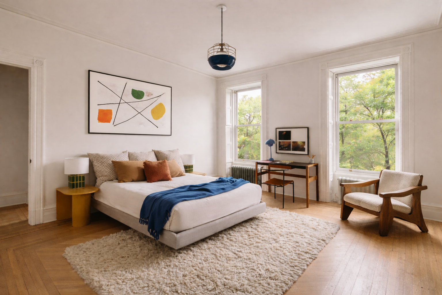 Serene bedroom with abstract artwork.png