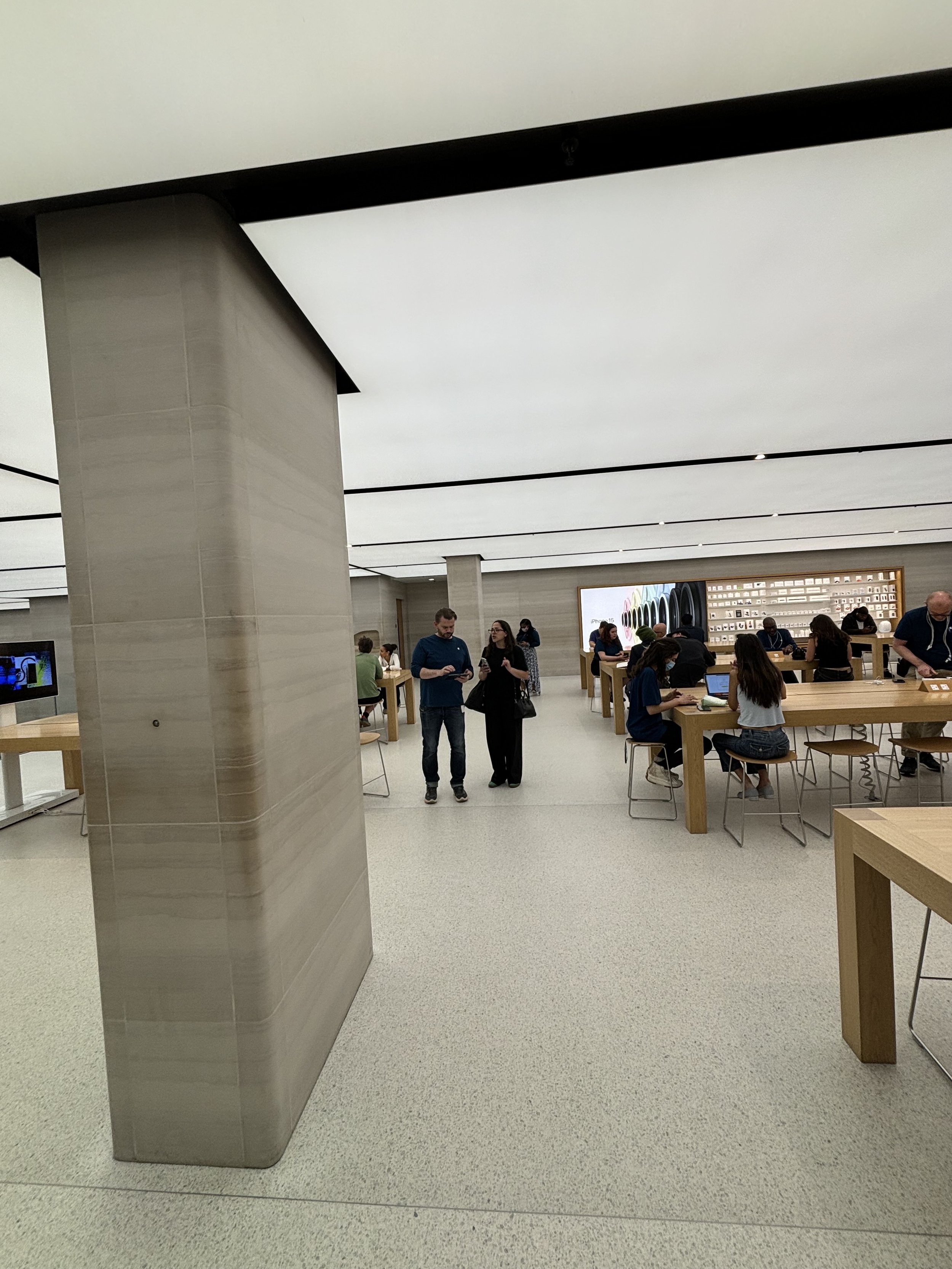 APPLE STORE. WHY IS THE CEILING SO LOW? IT'S SURELY A FALSE CEILING AND HIDING SOMETHING THEY DON'T WANT YOU TO SEE. UPON ENTERING A SIDE AREA - I WAS CHALLENGING ON USING THE LIFT UP TO THE TOP FLOOR (THERE ARE SEEMINGLY ONLY 2 FLOORS BUT THEY WERE