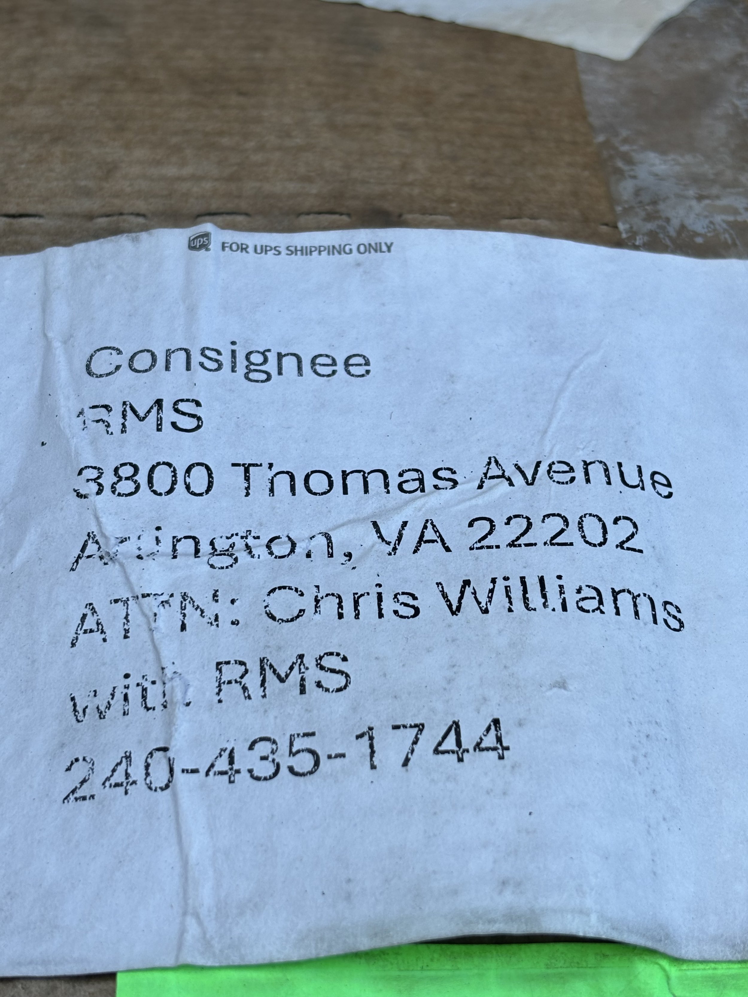 A CONSINGMENT DELIVERY NOTE TO ‘RMS’ WHO ALSO HAVE MANY LARGE ‘STORAGE’ CONTAINERS LITTERED AROUND THE AIRPORT