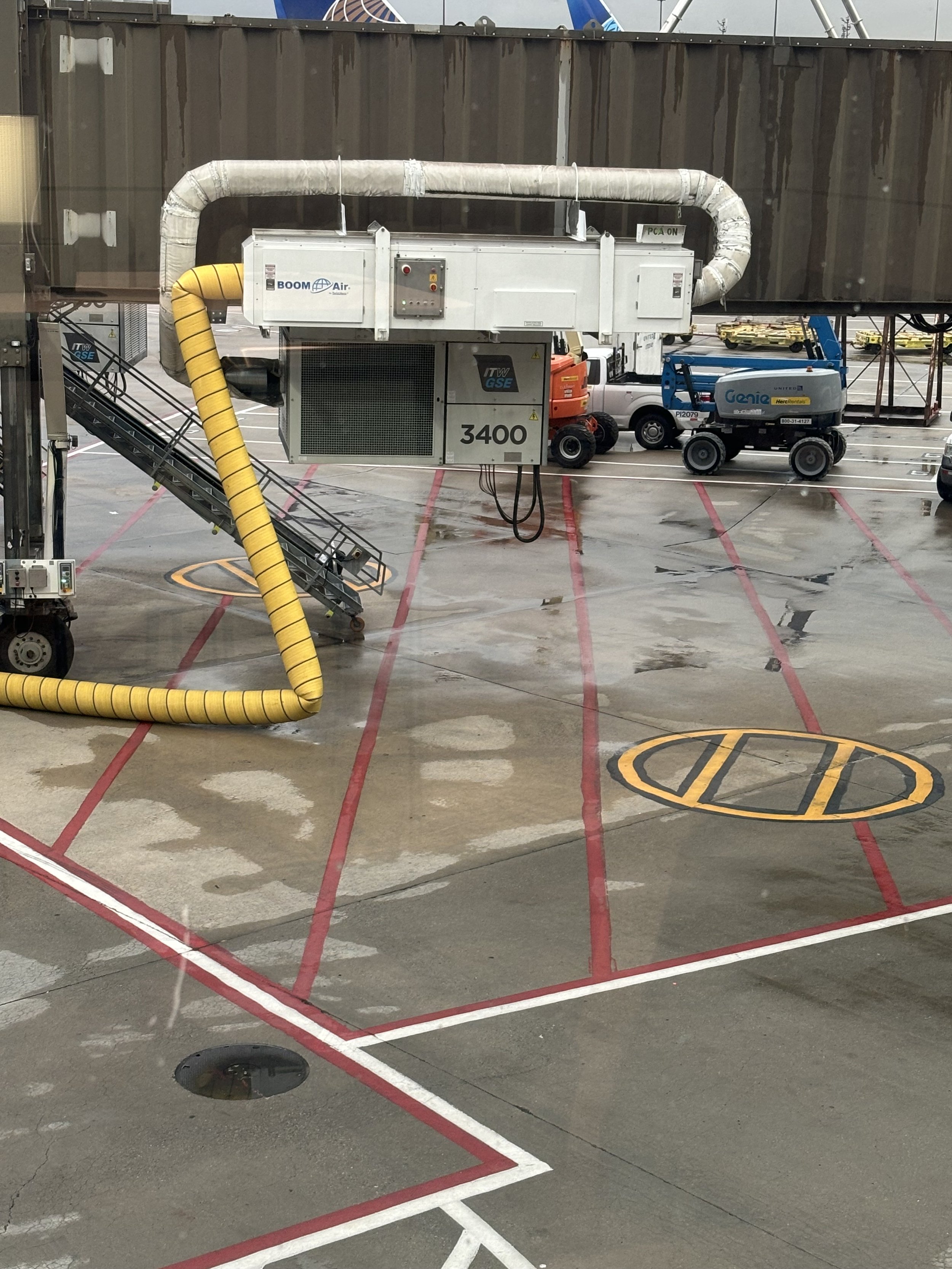 A CLOSE-UP OF THE 'BOOM AIR' COMPRESSOR WHICH GOES INTO THE PLANE'S WING