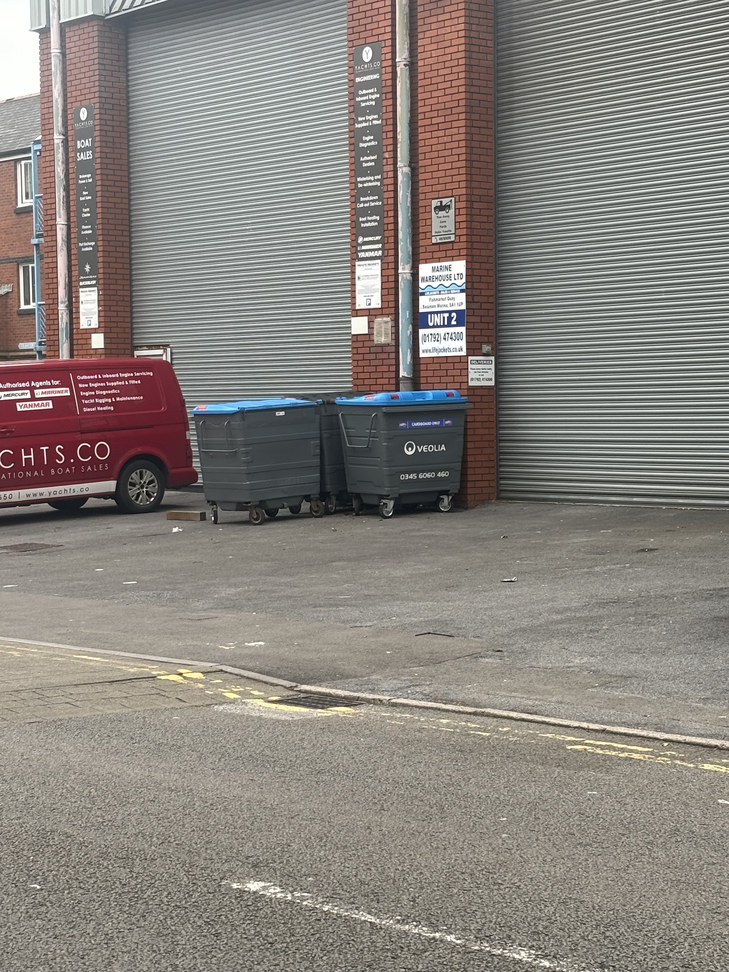 ANOTHER UNIT WITH THE HALLMARKS OF THE PREVIOUS AND ALSO WITH RECYCLING BINS OUTSIDE