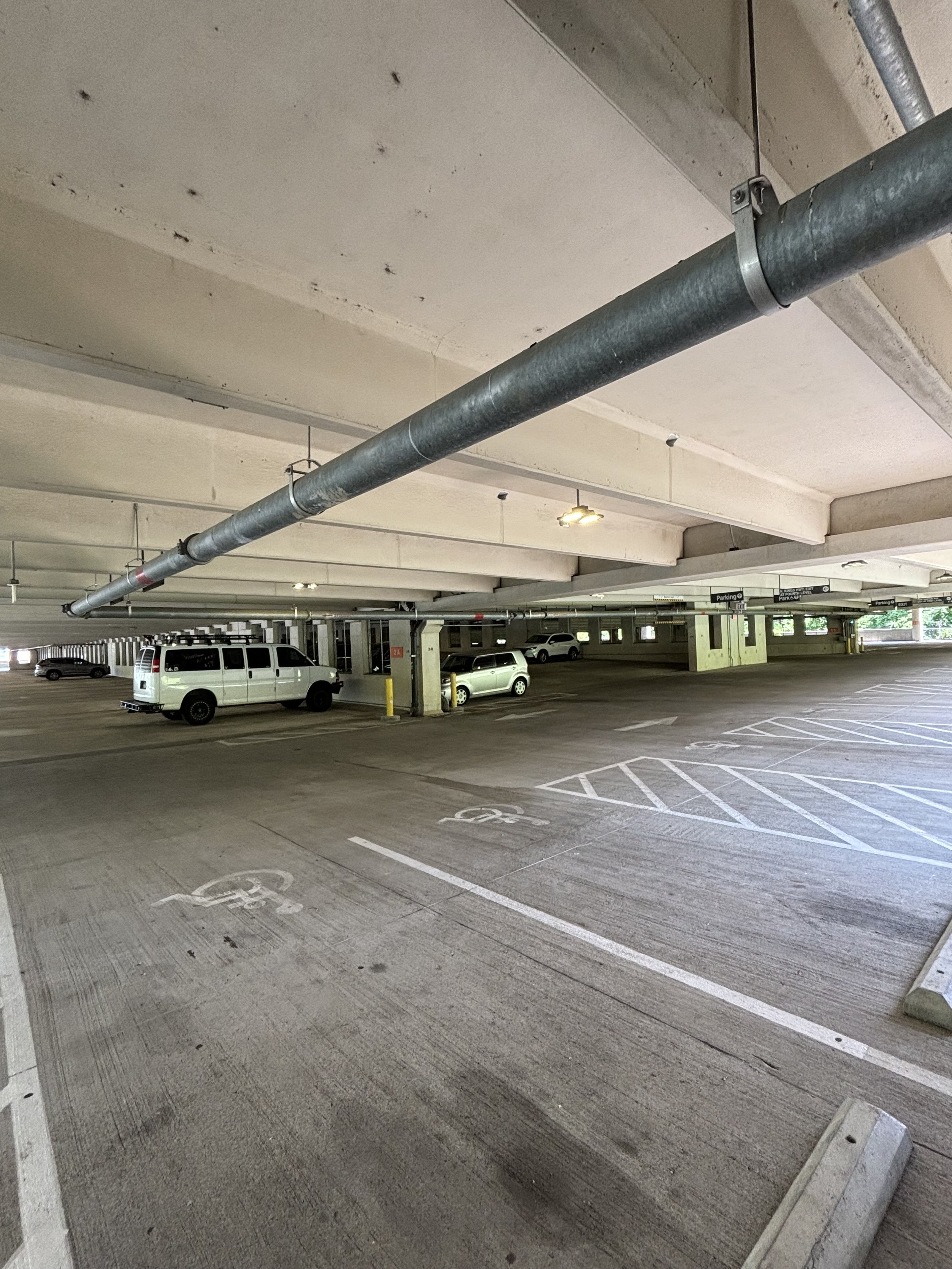 A STRONG, PUNGENT CLEANING SMELL ON MOST FLOORS. A LARGE NUMBER OF BIG PIPES RUNNING ALL THE WAY DOWN LENGTH OF BUILDING