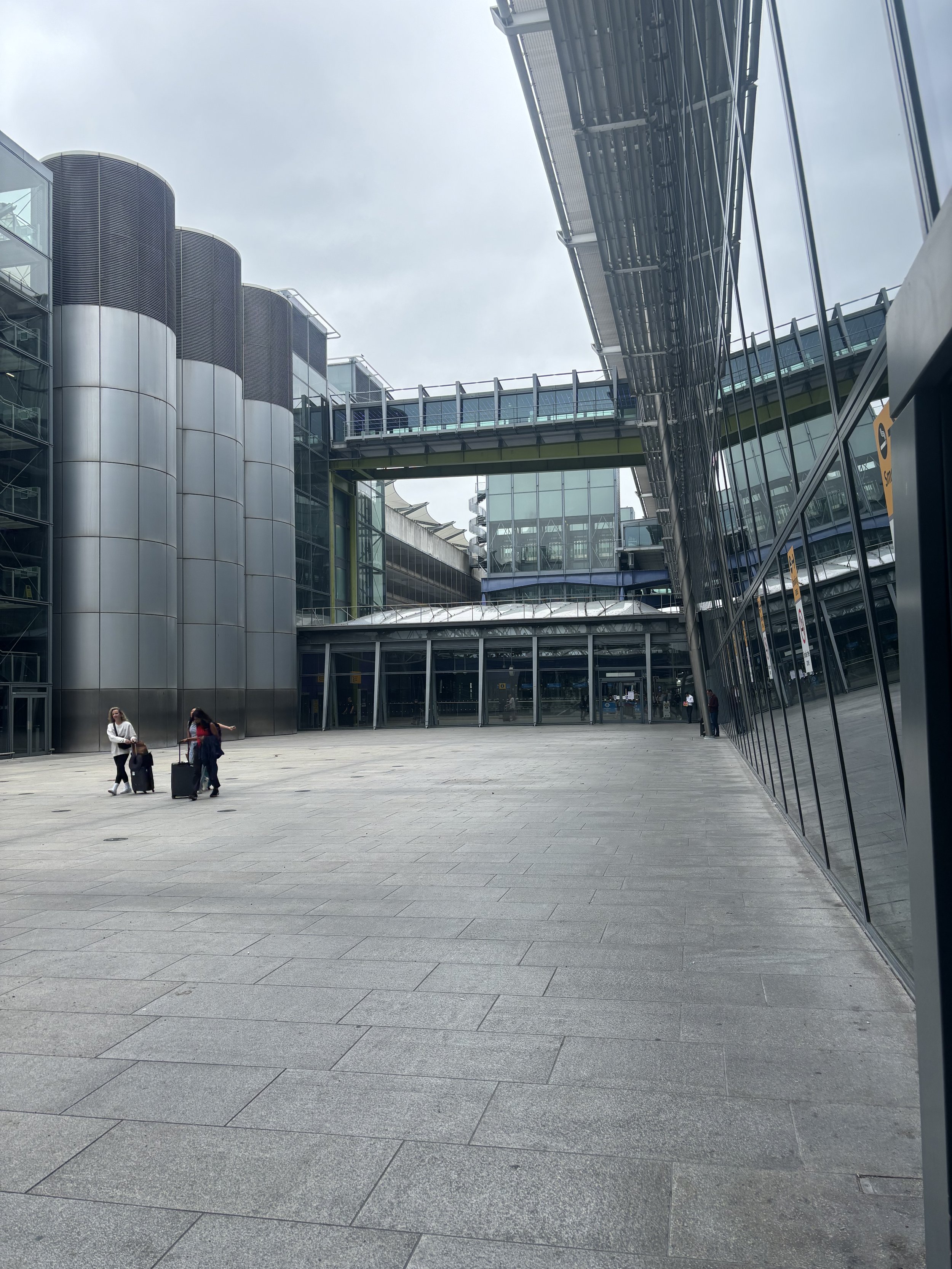 HUGE CHIMNEUS WHICH BLEND INTO THE DESIGN OF THE TERMINAL. HIDDEN IN PLAIN SIGHT