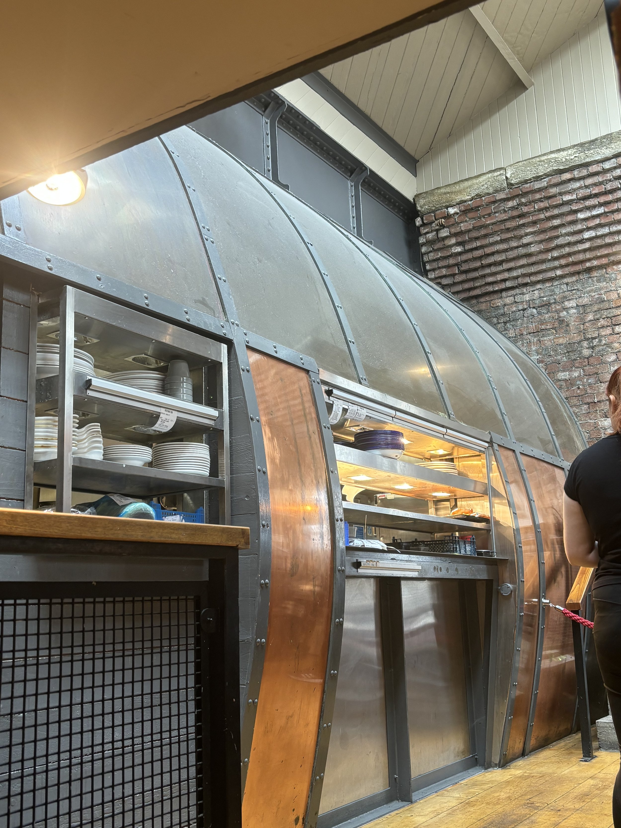 A VERY INTERESTING 'OVEN' INSIDE. IT'S VERY, VERY LARGE AND WOULD IS IT BEING USED FOR MORE THAN YOUR SUNDAY ROAST? IT'S LITERALLY A WALK-IN OVEN