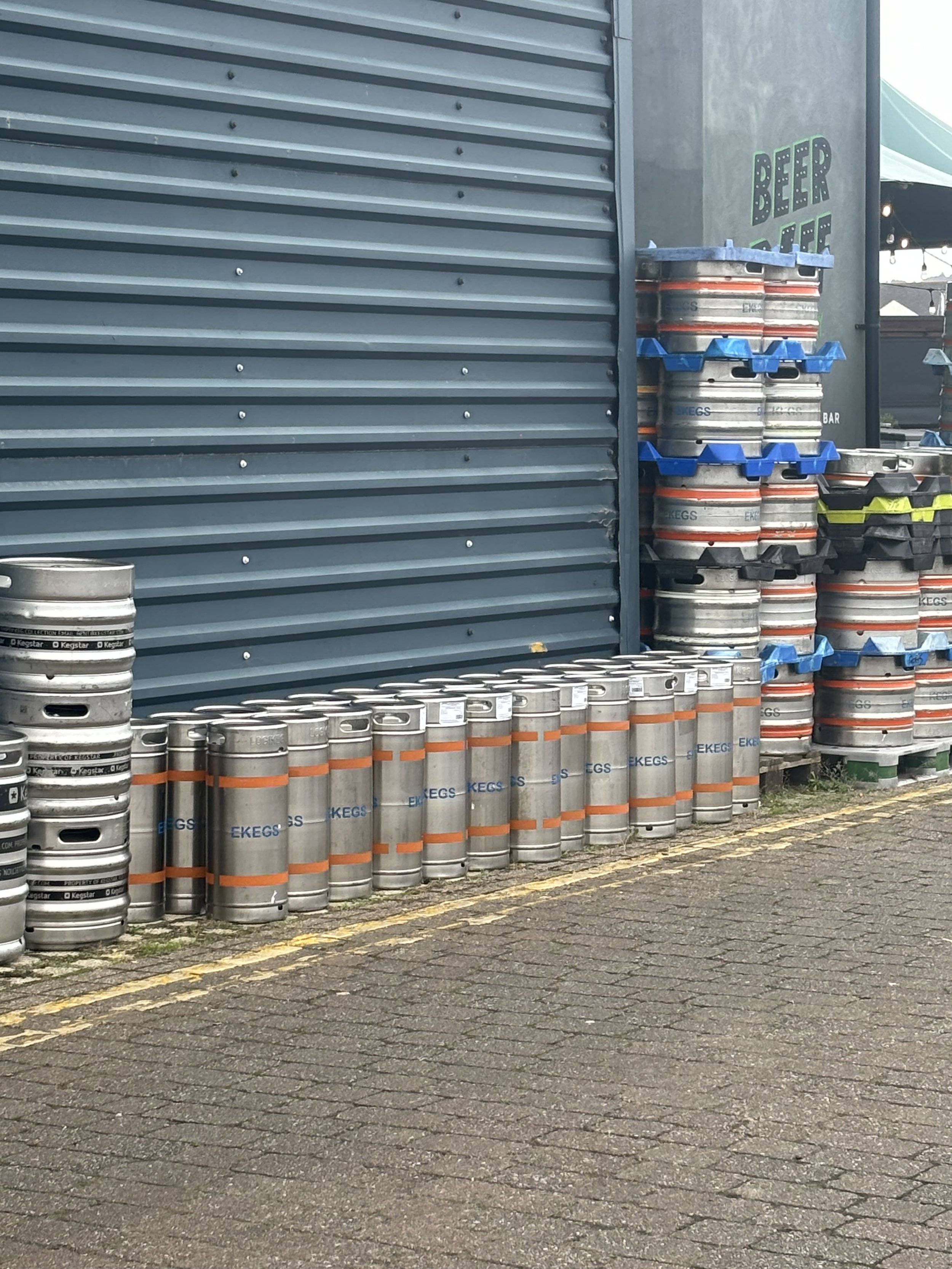 ONCE AGAIN, A HUGE NUMBER OF ITEMS AROUND A LARGE SHUTTERED DOOR. PEOPLE WOULD GET MISDIRECTED AT ALL THE BARRELS AND NOT CONSIDER WHAT’S INSIDE