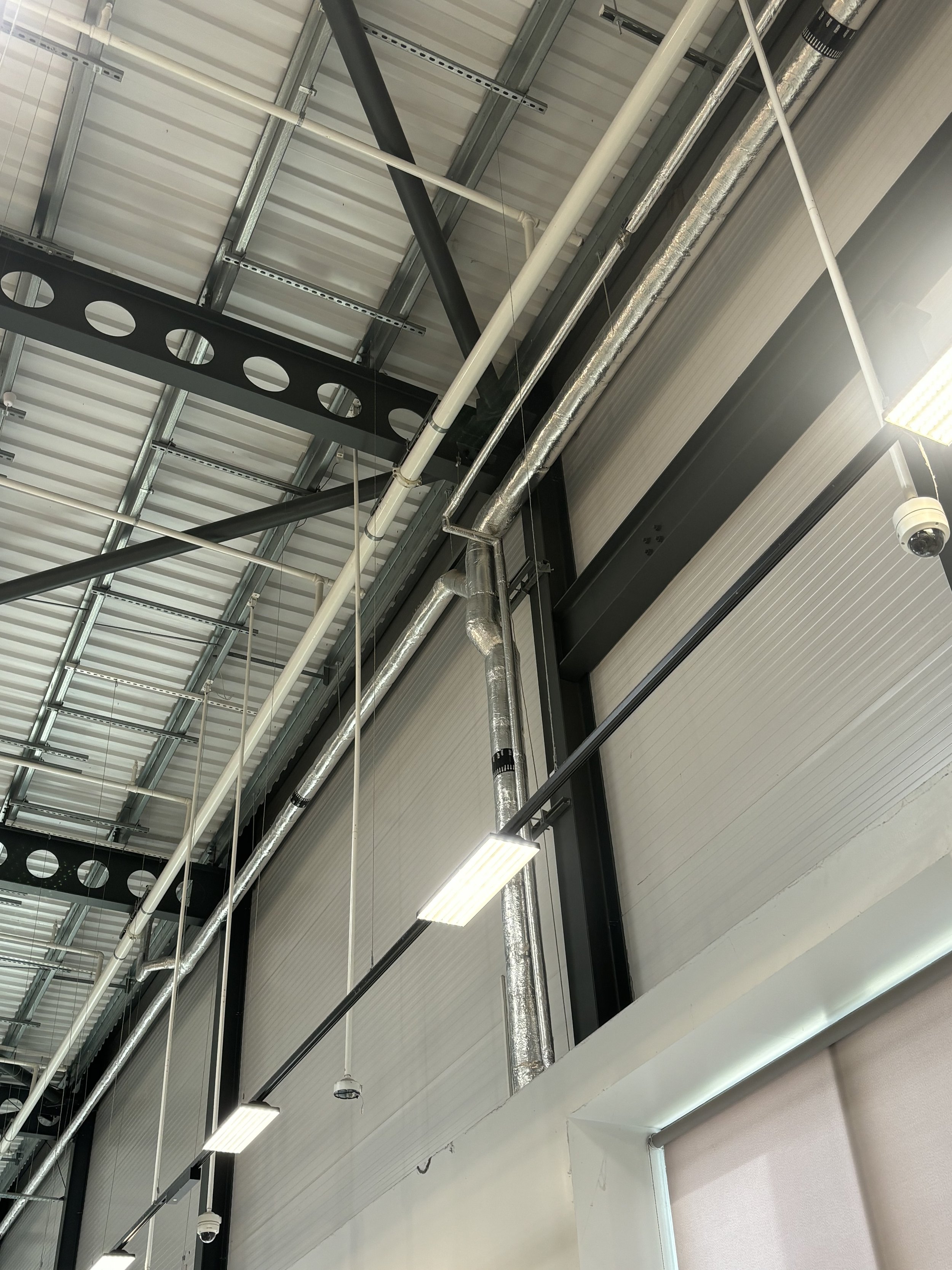 MOTHINNER PIPES TOWARDS THE FRONT OF THE STORE. LARGER PIPES TOWARDS THE BACK OF THE STORE