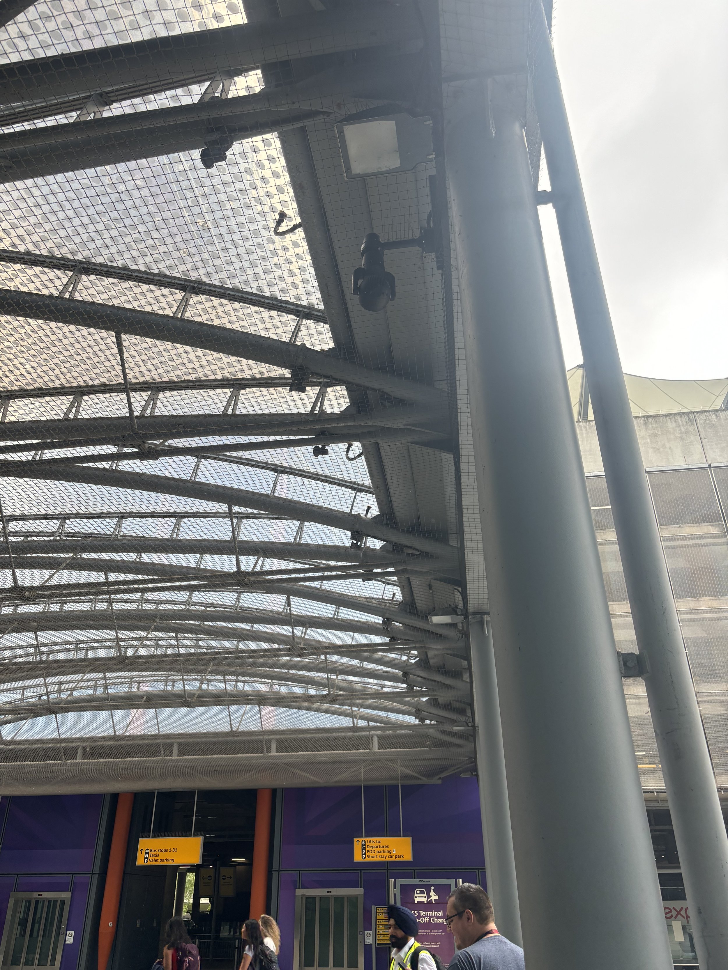 EVEN THE COVERINGS OF OUTSIDE AREAS FEATURES TUBES / PIPES AND IT'S EVERYWHERE IN THE AIRPORT