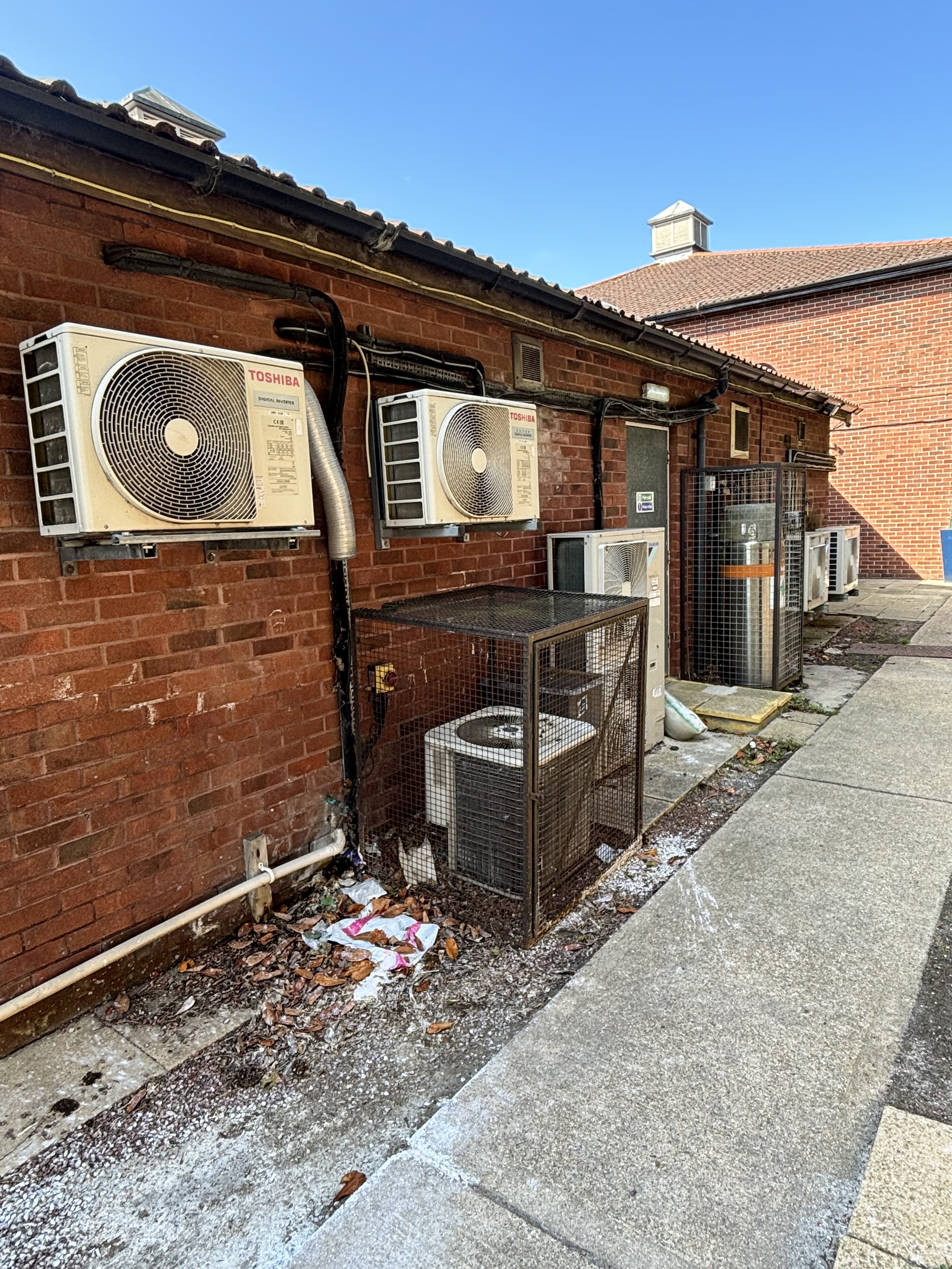 A LARGE ARRAY OF HEATERS, FANS, PIPES, CHEMICALS (SILVER CONTAINER) - PERFECT INGREDIENTS IN AN AQUAMATION FACILITY