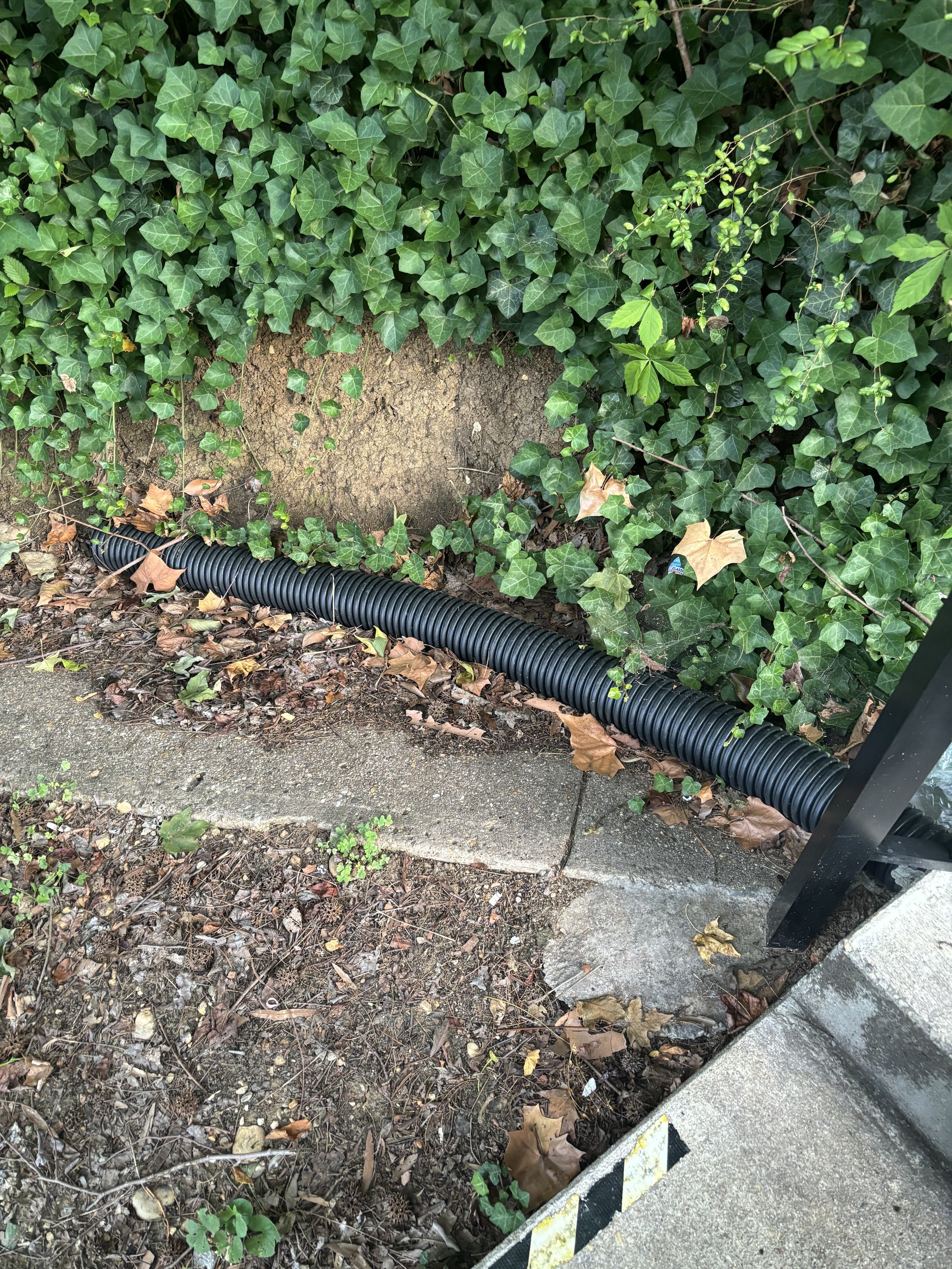 A PIPE EXITING THE GROUND FLOOR OF THE DAYS-INN AND IT COULD BE AQUAMATION LIQUIDS