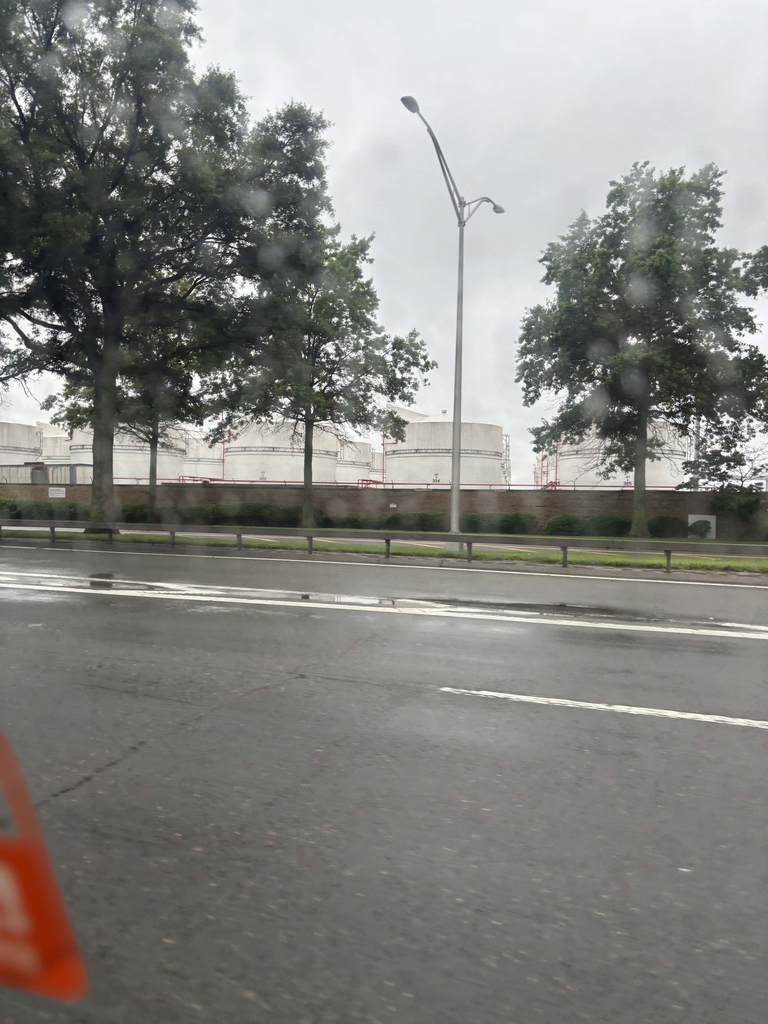 HUGE LIQUID STORAGE AREAS UPON ENTERING THE PERIMETER OF JFK AIRPORT