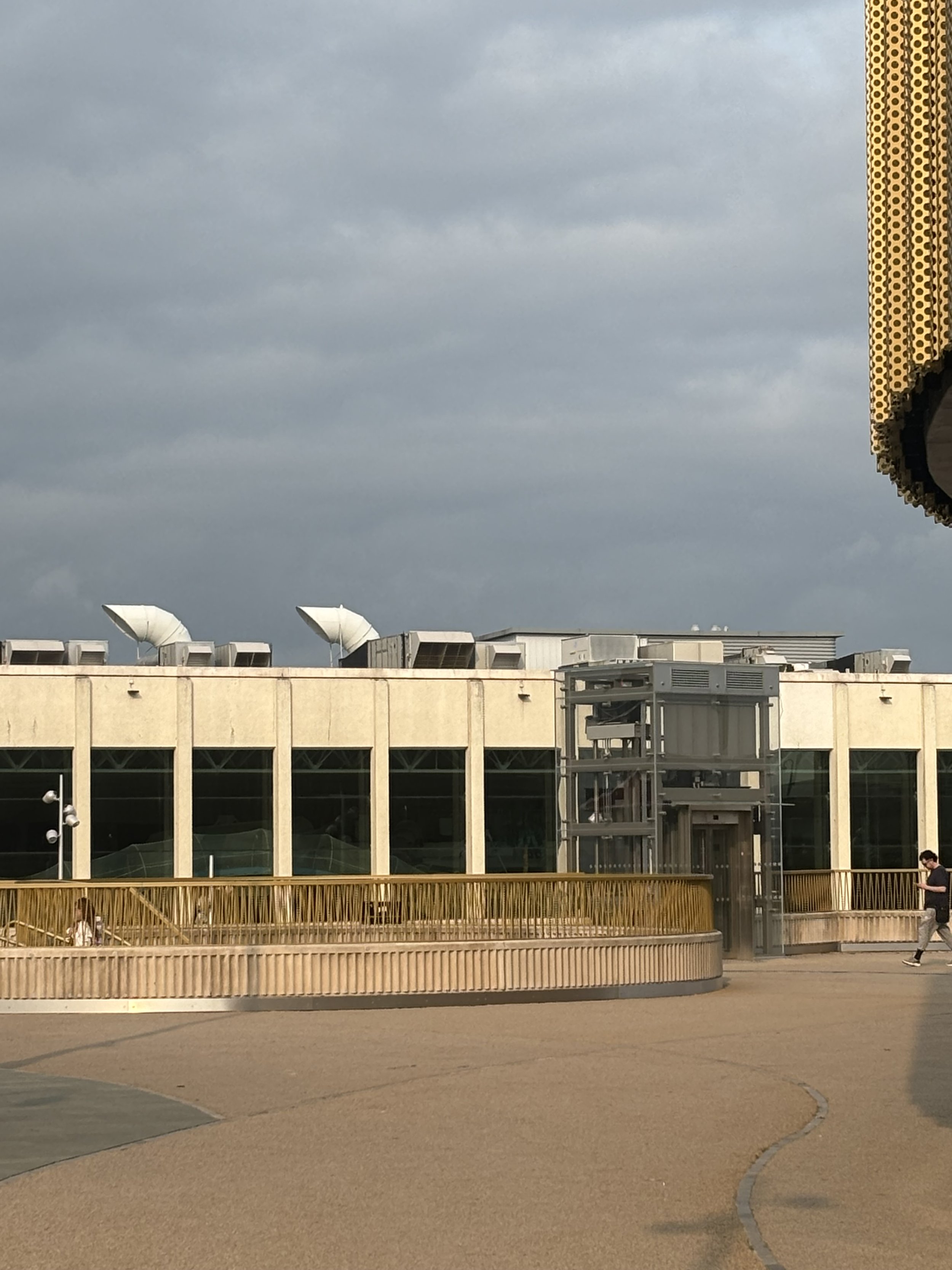 SWANSEA LEISURE CENTRE. SOME HUGE CHIMNEYS ALONGSIDE WHAT SEEMS TO BE INCINERATORS AND CONDENSOR UNITS