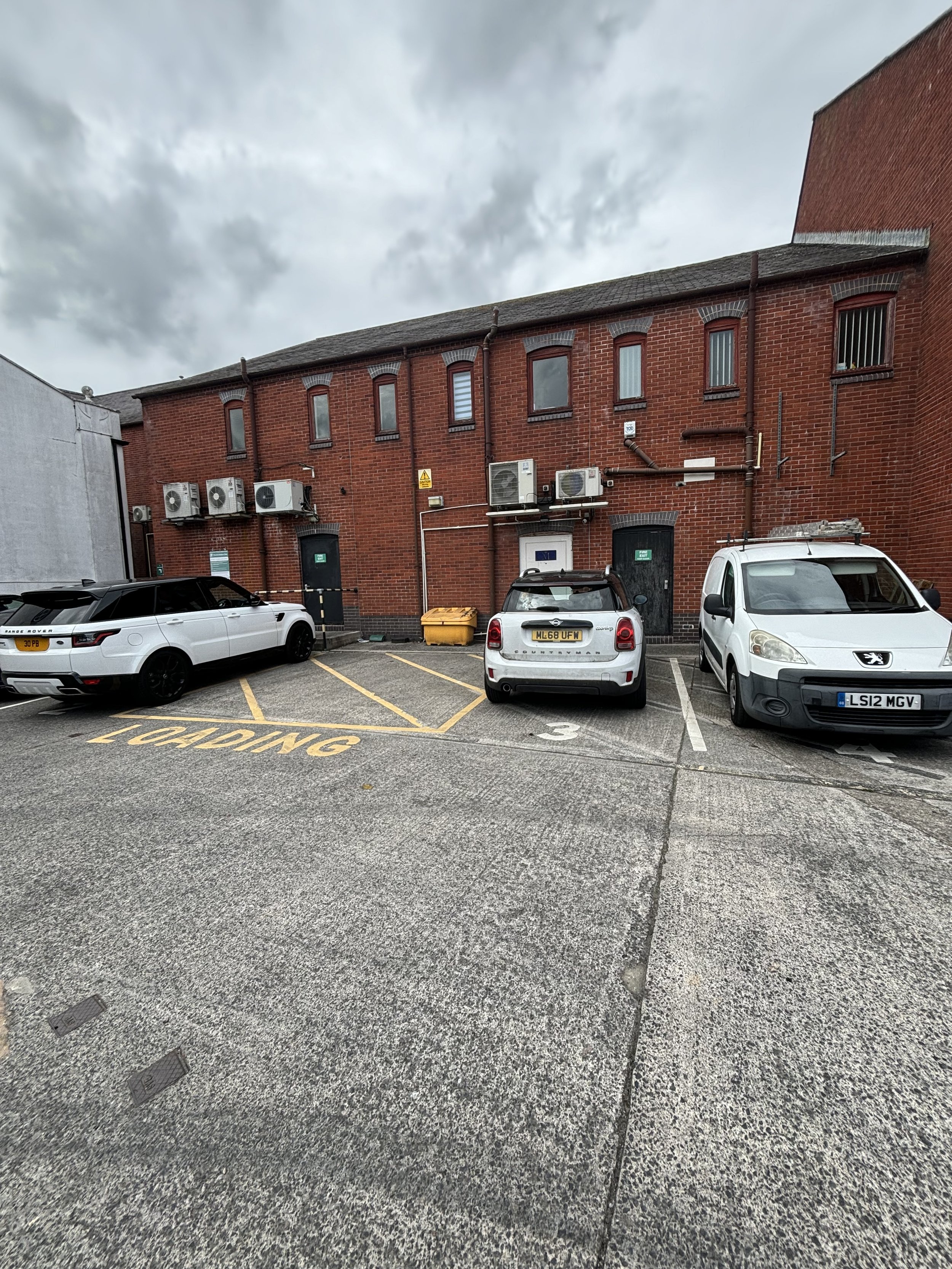 A WIDER ANGLE TO TYHE PREVIOUS IMAGE OF THE EQUIPMENT BEING HOUSED IN THE AREA