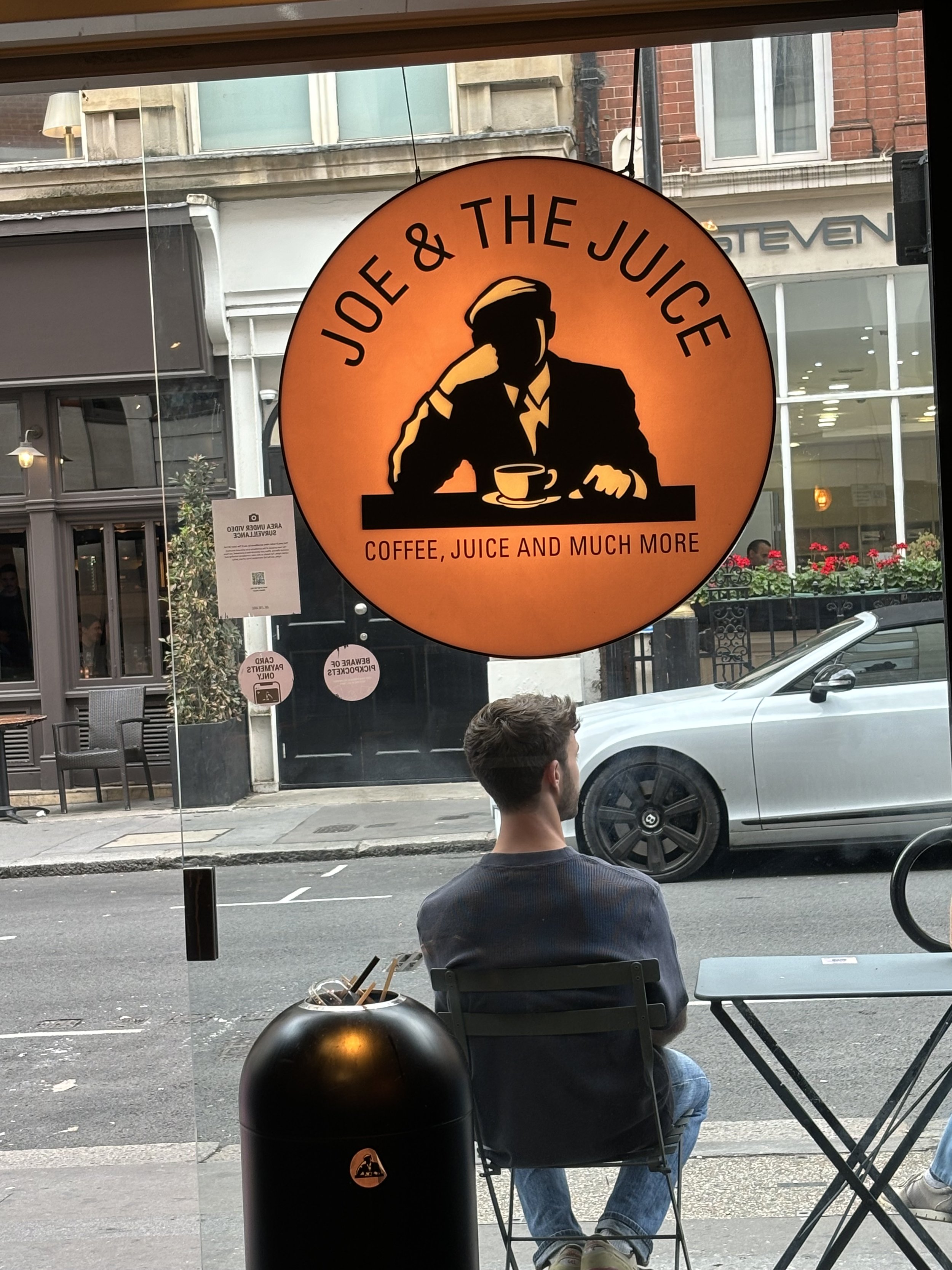 NEAR BOND STREET. AN APTLY NAMED CAFE CALLED 'JOE AND THE JUICE' MIGHT HAVE A MORE REALISTIC DESCRIPTION OF WHERE THE WATER AND INGREDIENTS OF THAT MID-MORNING TEA/COFFE AND CAKE ACTUALLY COMES FROM. THE MOCKERY IS IN THE NAME!