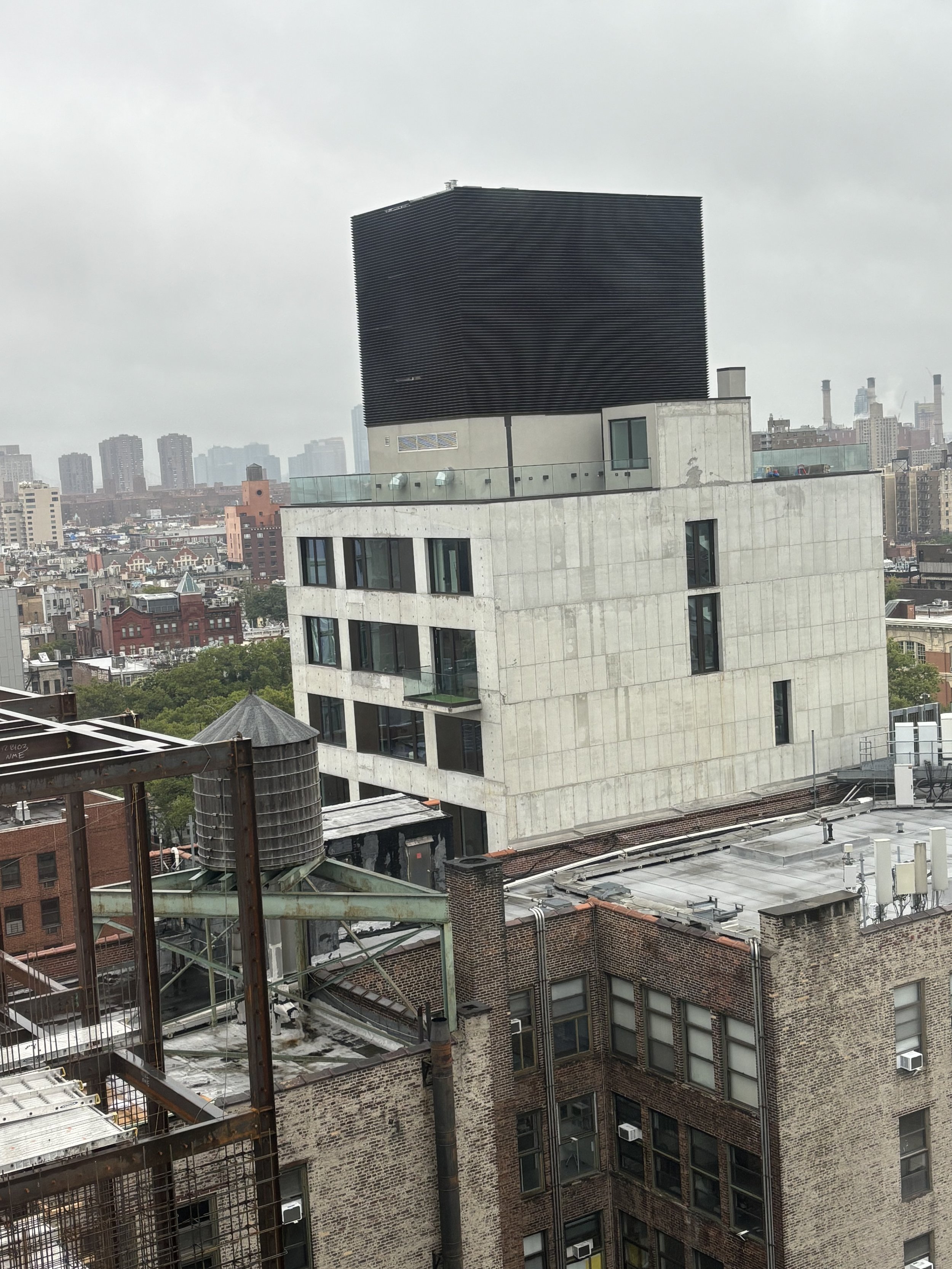 ANOTHER GENERIC BUILDING ON TOP OF ANOTHER BUILDING COMPLEX. CLEARLY NOBODY LIVES THERE AND BY IT'S GENERIC APPEARANCE - IT' LOOKS LIKE AN AQUAMATION FACILITY