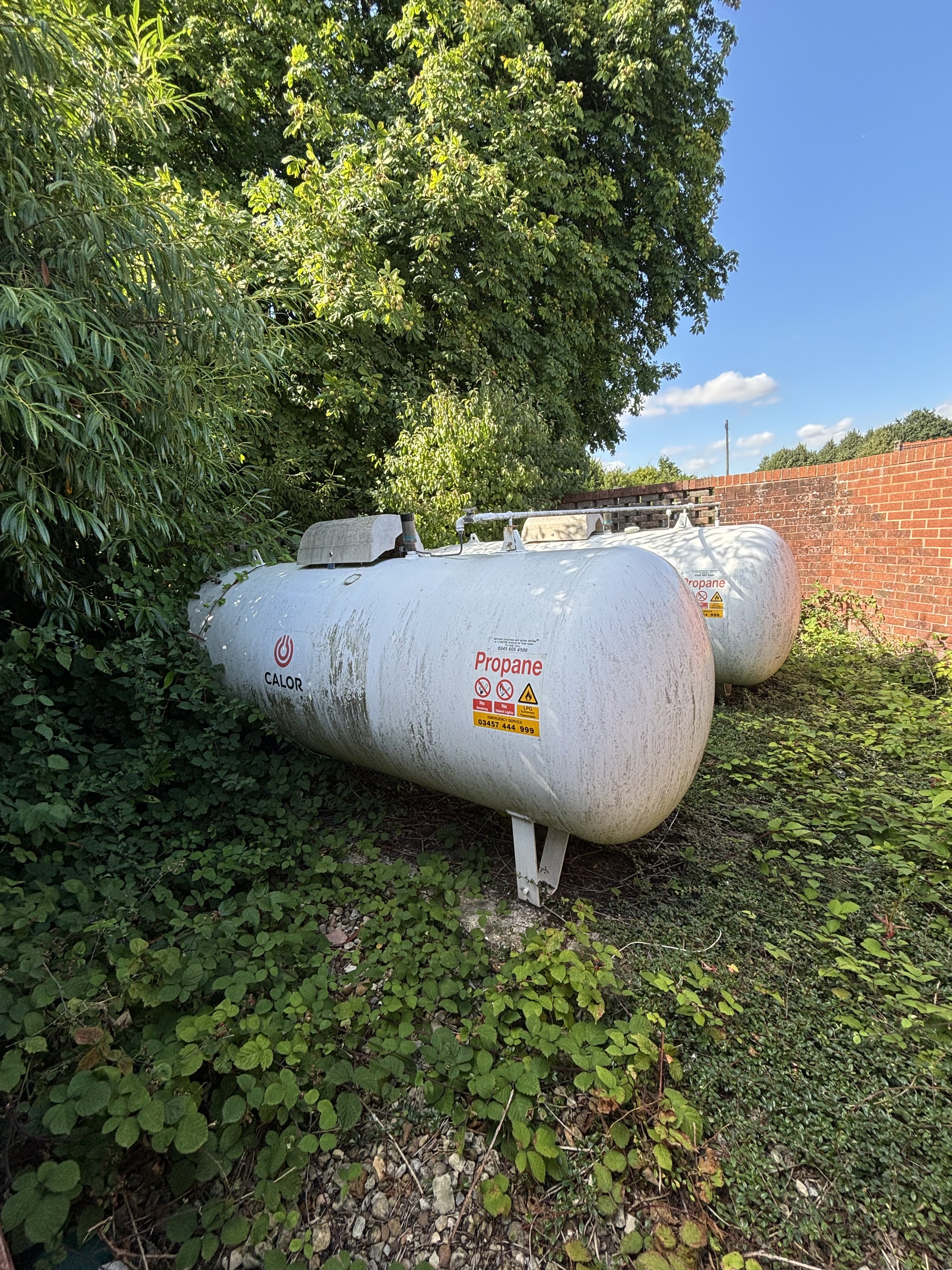 THERE IS A SEPARATE COMPOUND NEAR THE ENTRANCE (LOOKS LIKE A BINS AREA) BUT IT'S PROPANE GAS WHICH CAN BE USED AS A FUEL FOR MANY DIFFERENT APPLIANCES INCLUDING AQUAMATION