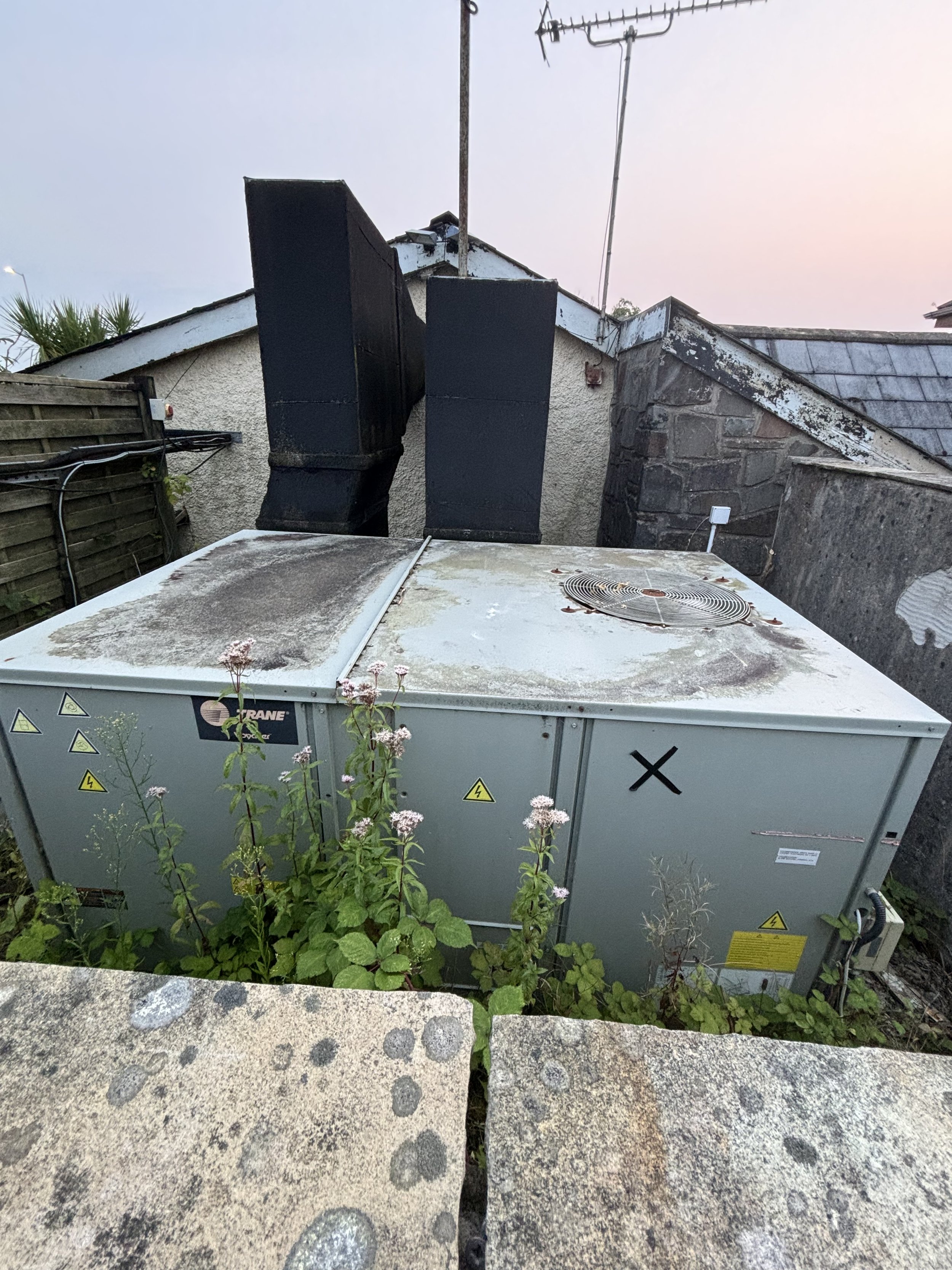 INDIAN (OLD GLAMORGAN ARMS) - PONTLLIW, SWANSEA. TWO HUGE CHIMNEYS (BLACK) AND WHAT SEEMS TO BE BODY ‘CHAMBERS’ FOR THE AQUMATION PROCESS OUTSIDE
