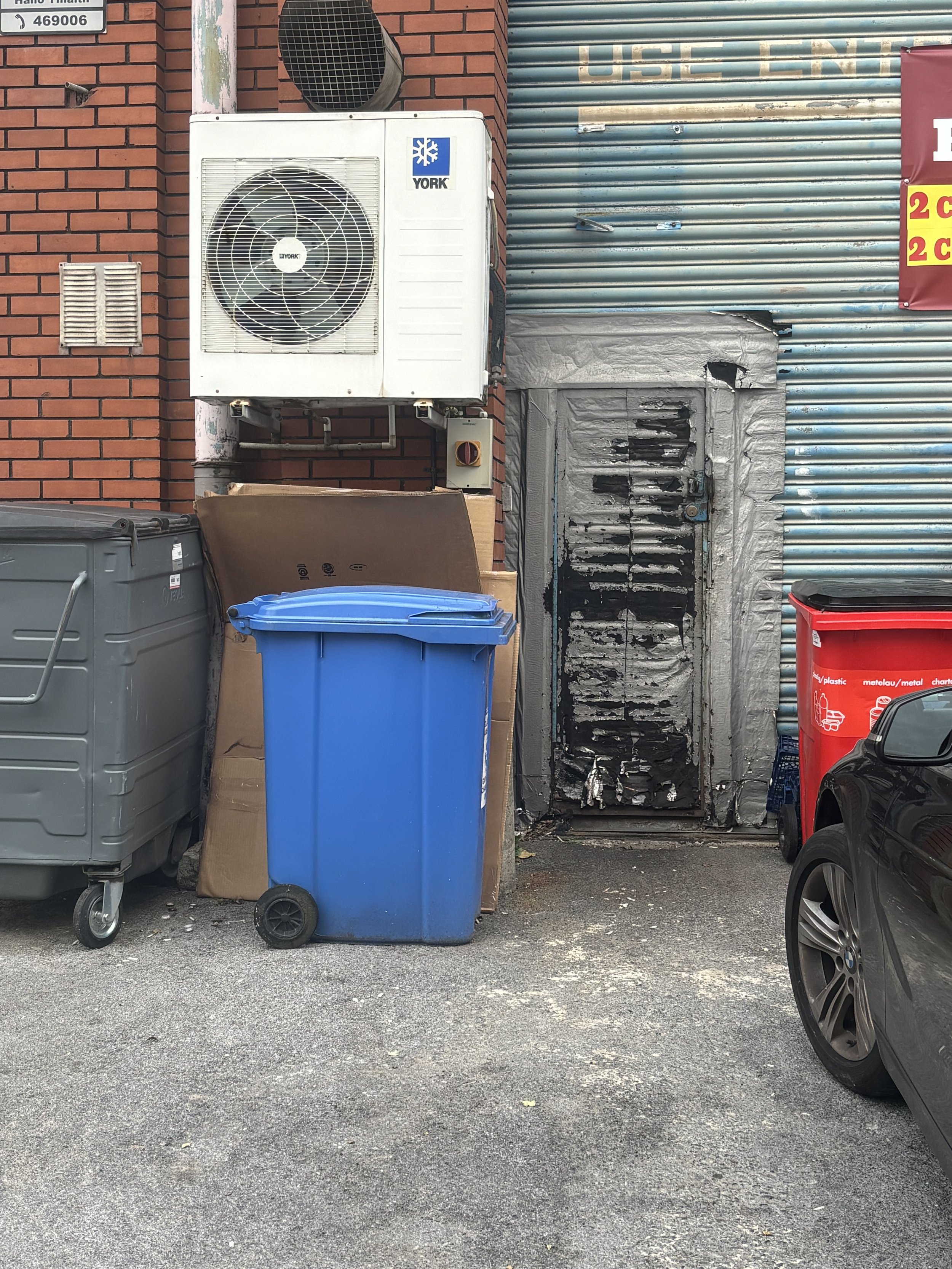 A CLOSE-UP OF A LARGE CHIMNEY AND AN EXTRACTOR FAN. WHY A LARGE CHIMNEY?