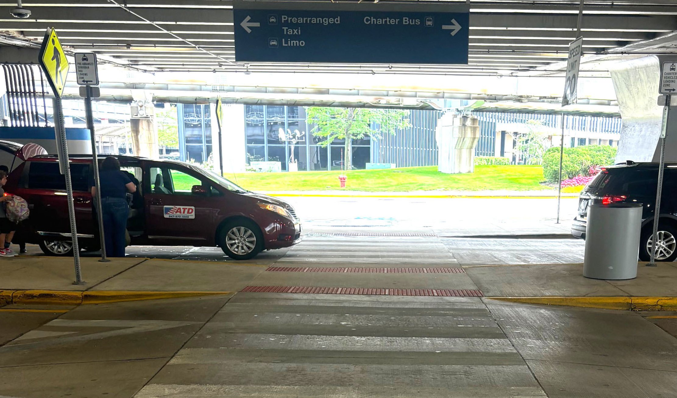 OPPOSITE WILL BE A CROSS AND A BUS WILL BE PARKED TO TAKE YOU TO THE FACILITY