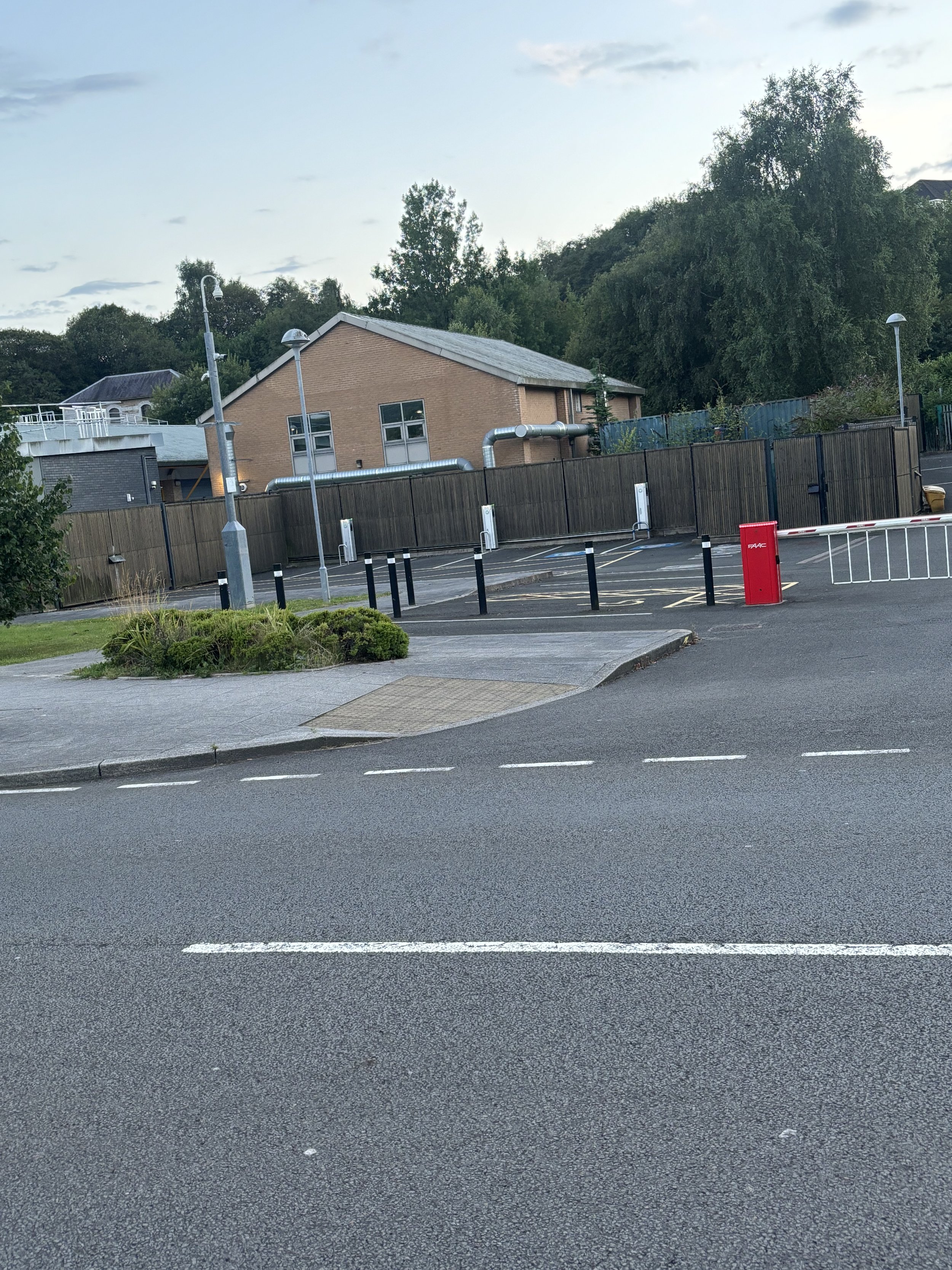 ADJACENT TO THE MAIN MERTHYR COLLEGE FACILITY IS A VERY LARGE COLLECTION OF PIPES, WRAPPING AROUND THE ENTIRE BUILDING AND THERE'S NO HIDING THE SIZE AND AMOUNT OF LIQUID WHICH CAN PASS THROUGH THEM. TO THE LEFT IS ANOTHER FACILITY WHICH LOOKS VERY C