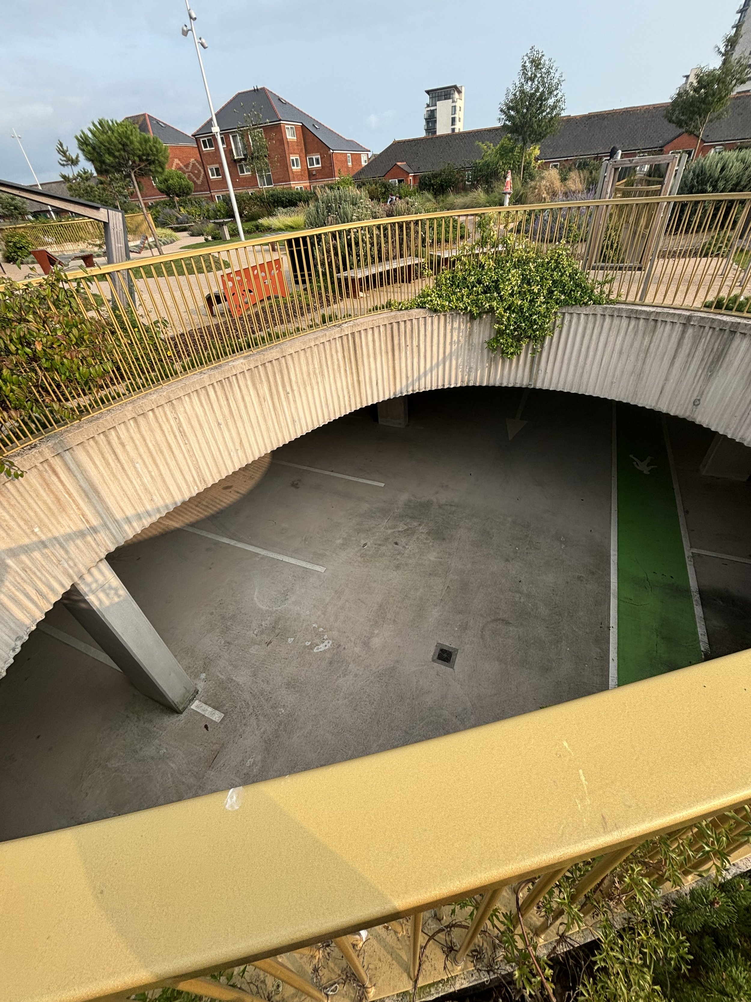 WHY DOES THIS CAR PARK HAVE AN OPEN ROOF AREA? ARE PLANES ABOVE DUMPING WATER WITH HUMAN DNA INTO THESE ‘HOLES’ TO GET RID OF THE EVIDENCE? THIS IS THE SAME AS ALEXANDRIA IN WASHINGTON DC