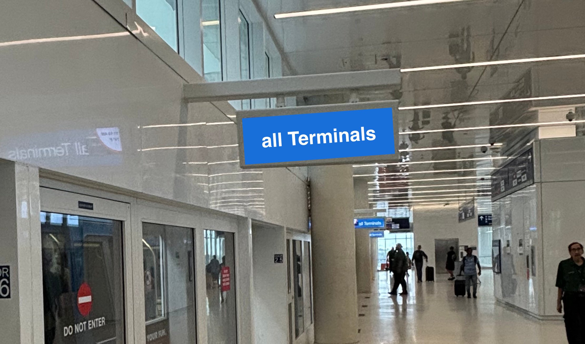 WHEN YOU ARRIVE AT THE AIRPORT TRANSIT, YOU WILL SEE BLUE SIGNS (THE ONE SHOWN IS ALL TERMINALS)