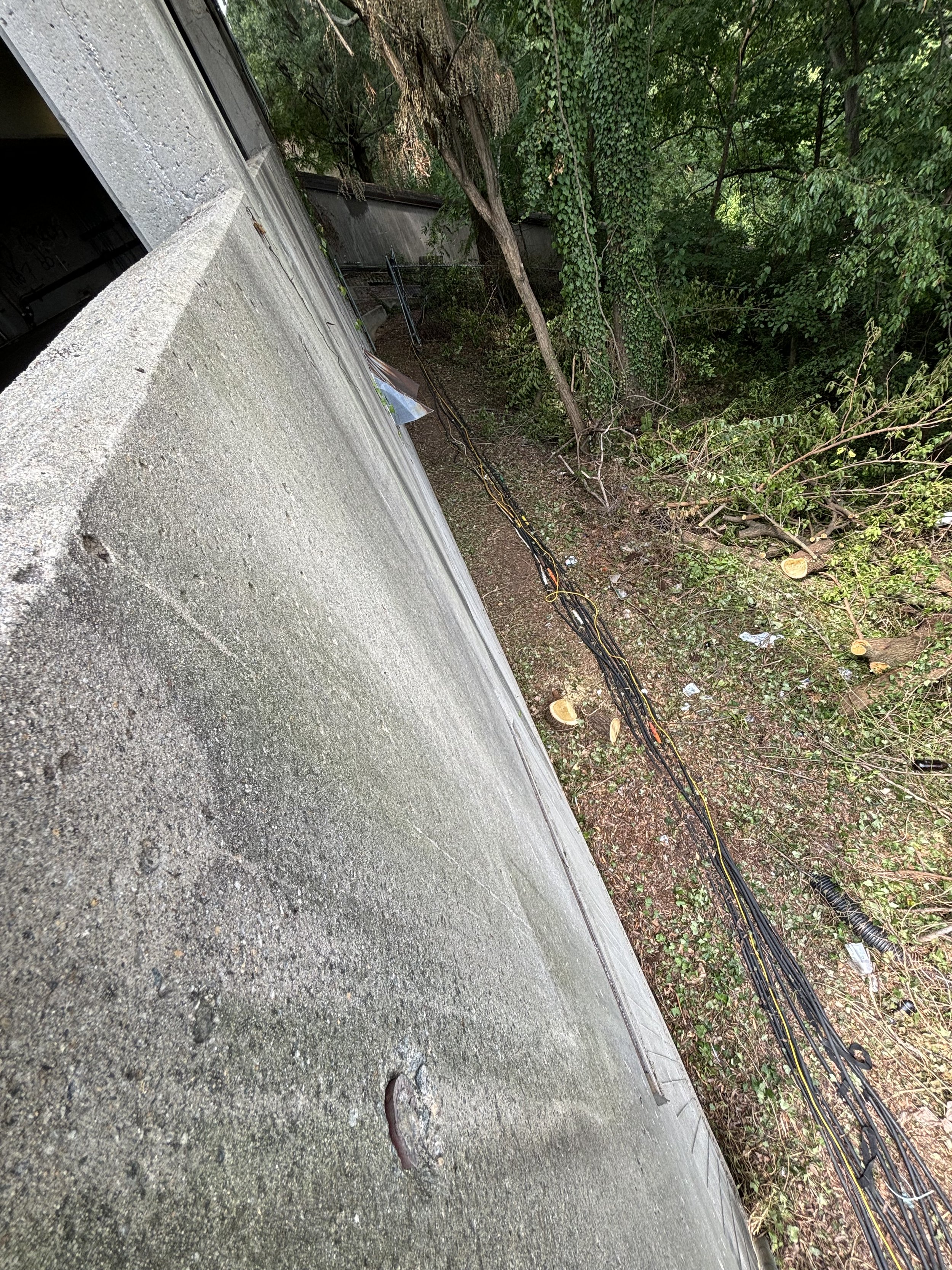 THEY CONTINUE TO RUN ALONGSIDE THE WIDTH OF THE BUILDING