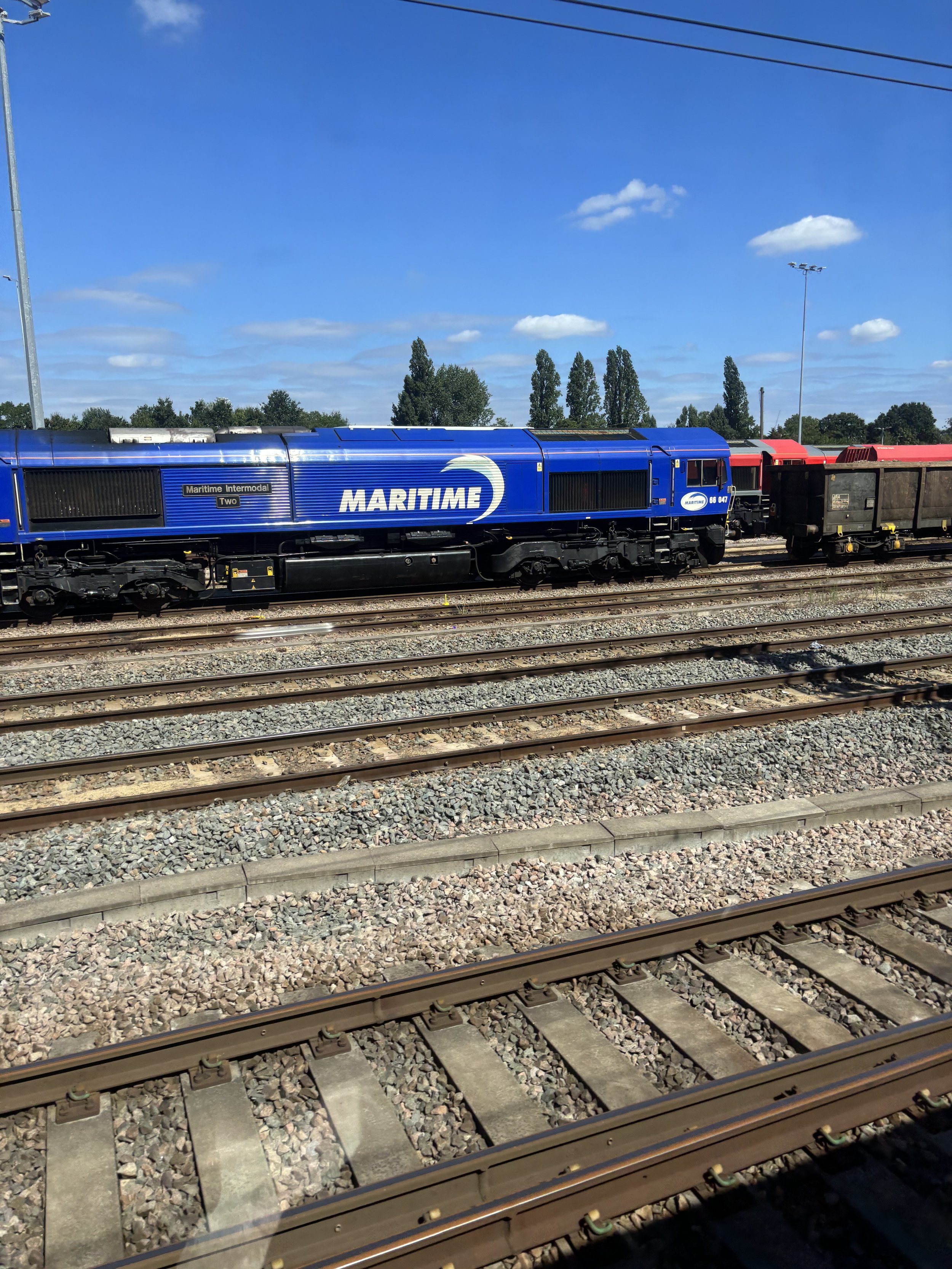 SLOUGH. MORE ROLLING STOCK HIDING WHAT'S BEHIND