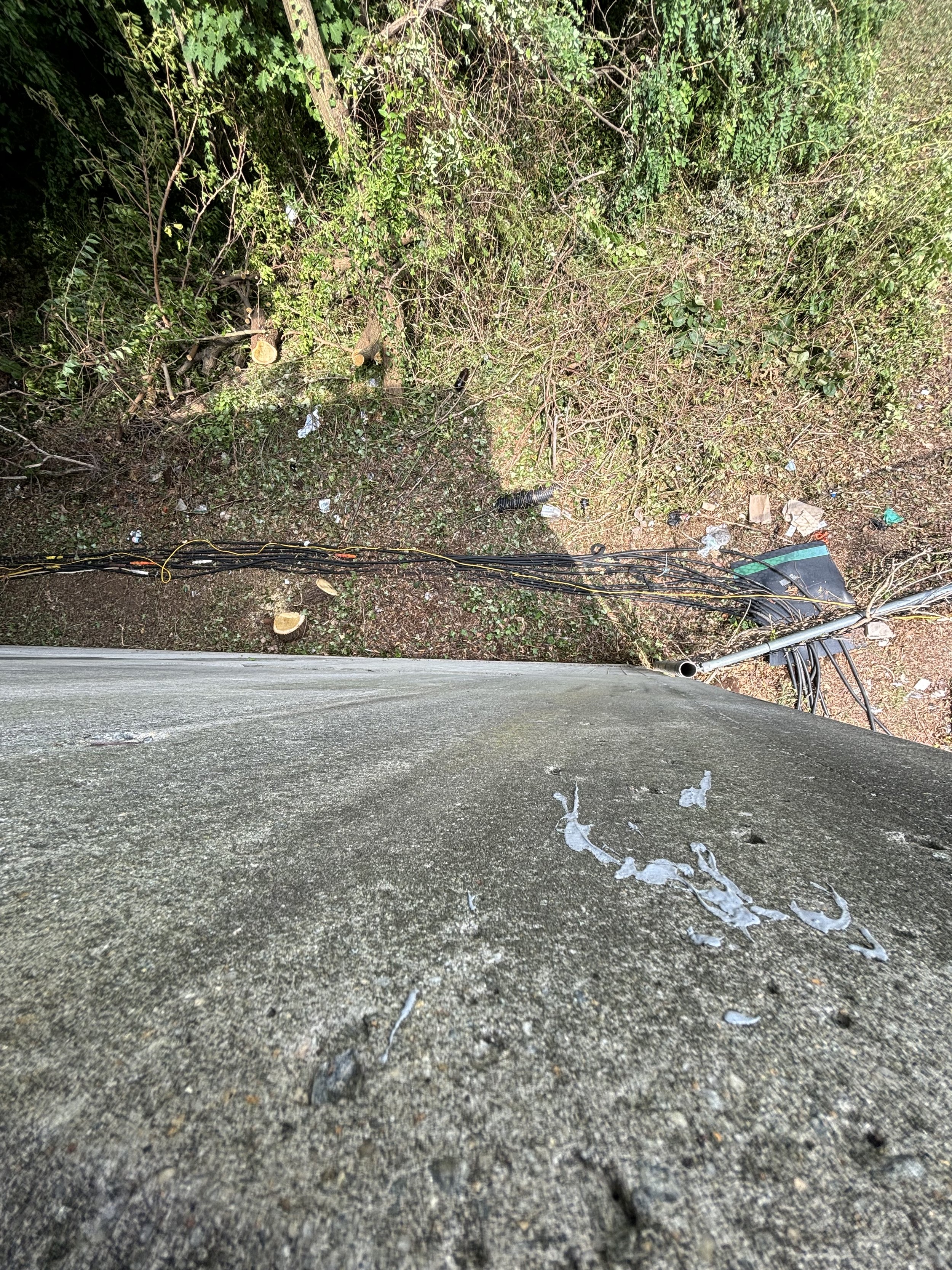THE LIQUID PIPES RUN ALONGSIDE THE WIDTH OF THE OLD CAR PARK