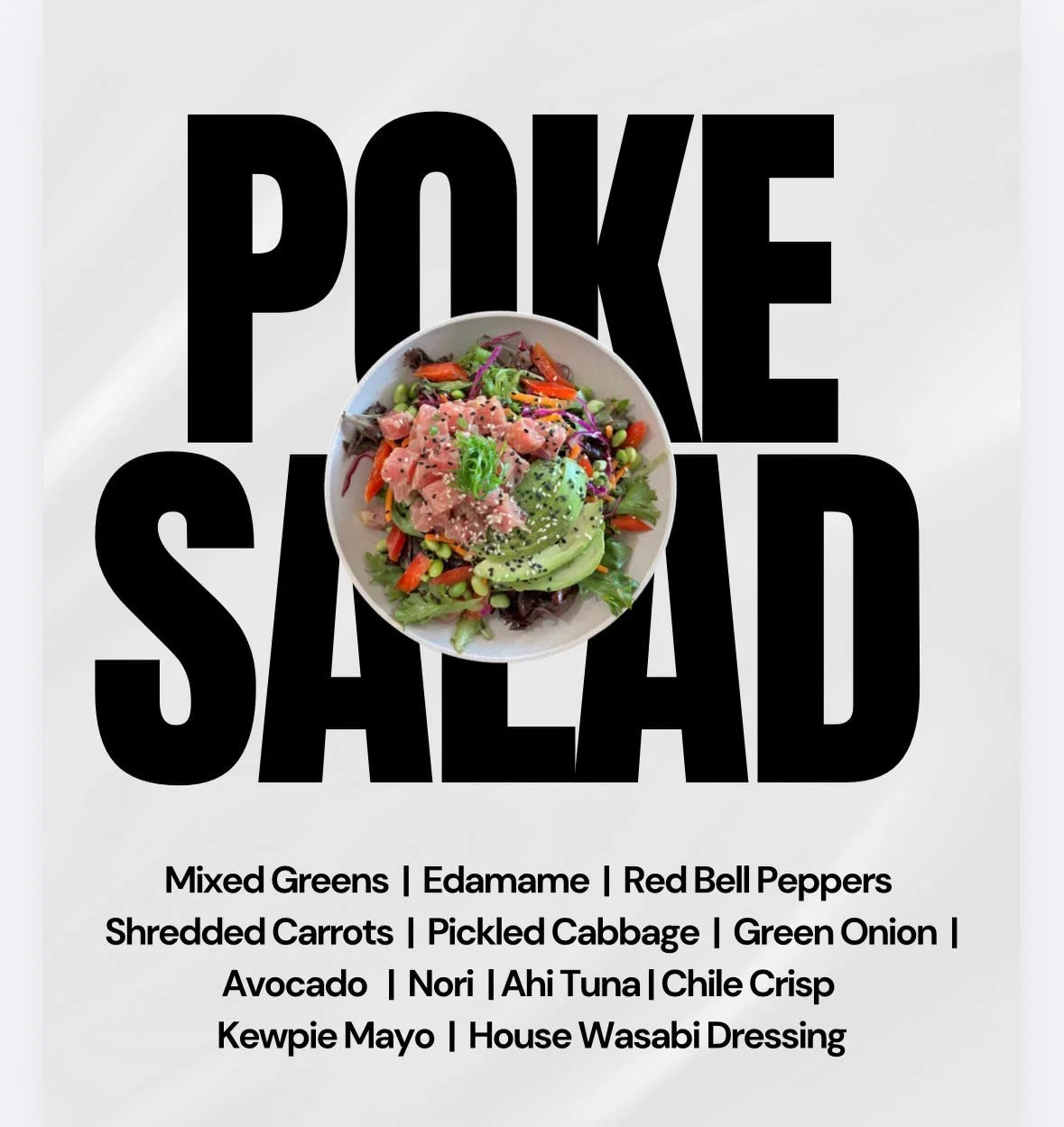 POKE SALAD, your love language. 💕 
Ahi tuna, creamy avocado, chile crisp, and our house wasabi dressing- all layered over crisp greens and fresh veggies. Fresh, bright, and exactly what February needs.  Lunch, done right 🥗