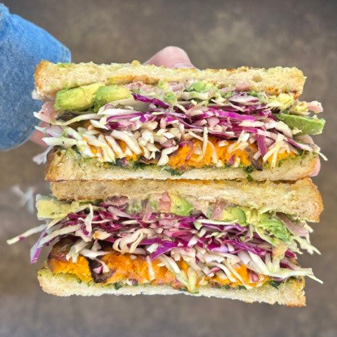 Meet your new lunch obsession: The Revival Sandwich.

It&rsquo;s stacked, it&rsquo;s craveable, and yes&hellip; it just happens to be vegan.
House roasted broccoli pesto, creamy white bean spread, house-pickled onions, power slaw, fresh avocado, and 
