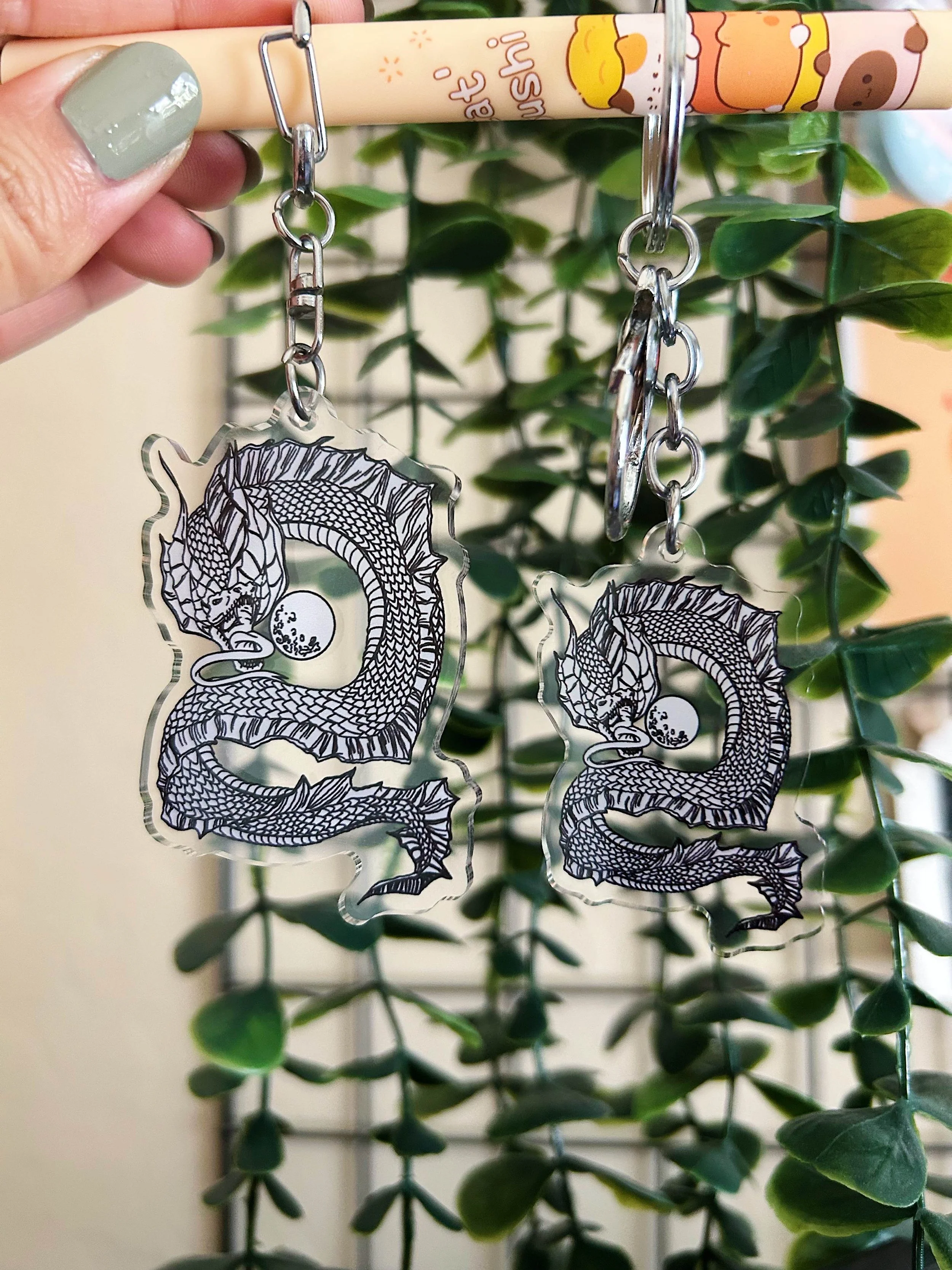 acrylic keychains - main is 1.5" x 2.5"; mini is 1.25" x 2"