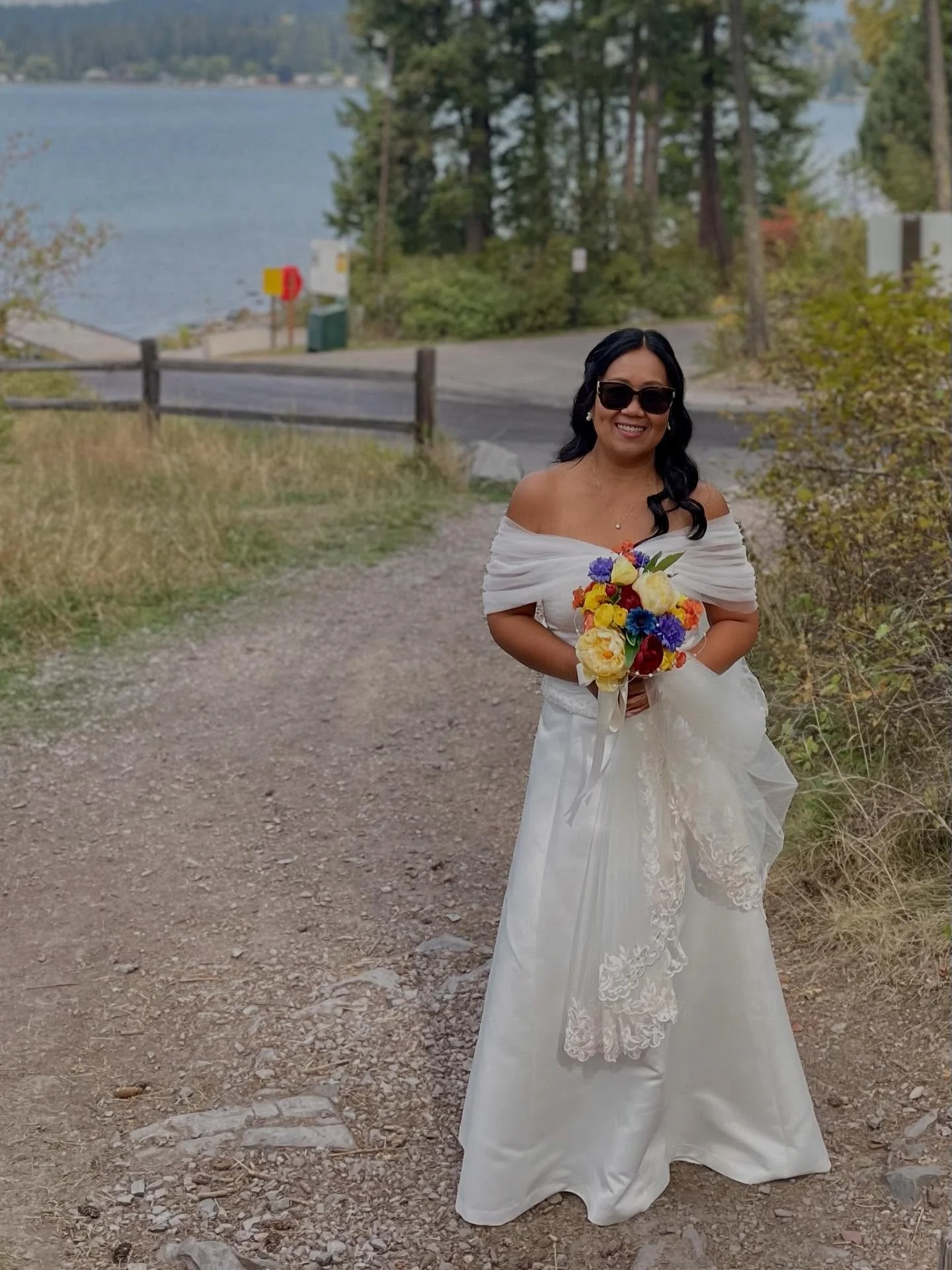 Brad &amp; Mila&rsquo;s cliffside &ldquo;I do&rsquo;s&rdquo; at Wayfarer&rsquo;s State Park were nothing short of magic. ✨ With Flathead Lake sparkling behind us, guests spread across the rocks like a band while geese flew overhead and a nearby fishi