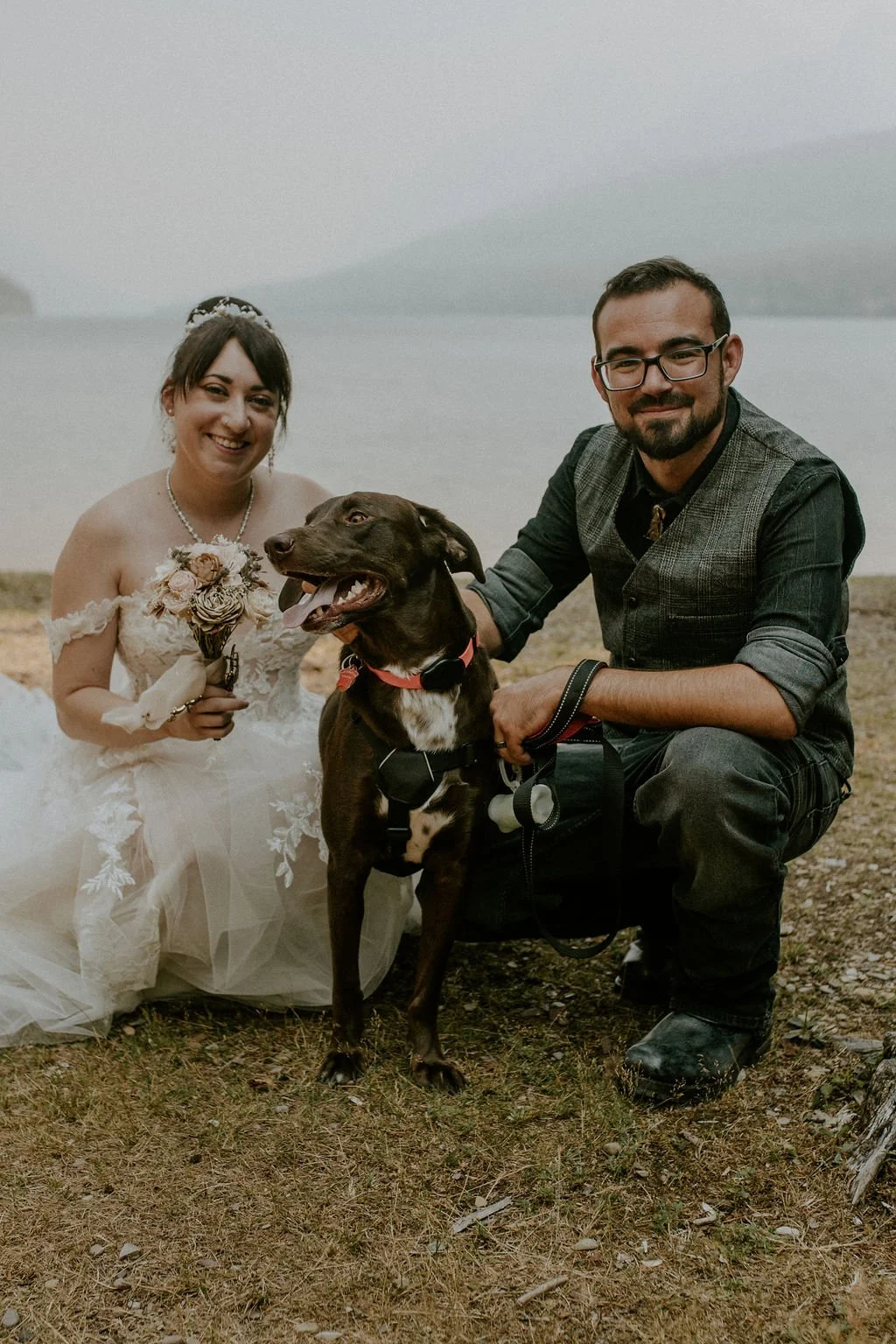 bride and groom with their dog