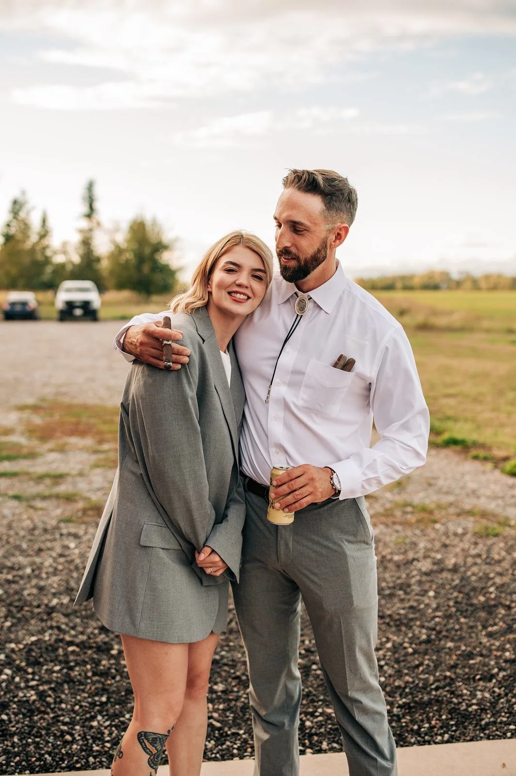 bride in the grooms jacket