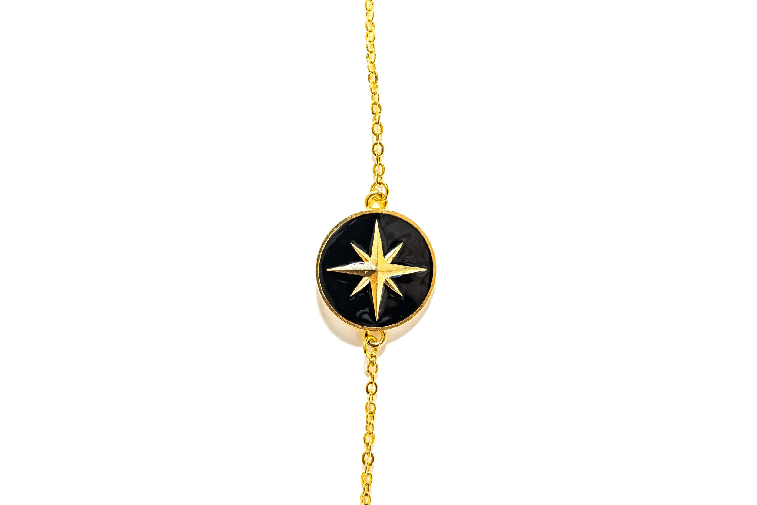 Bracelet Rose des vents, médaillon émaillé noir et doré en laiton à l’or fin 24 carats