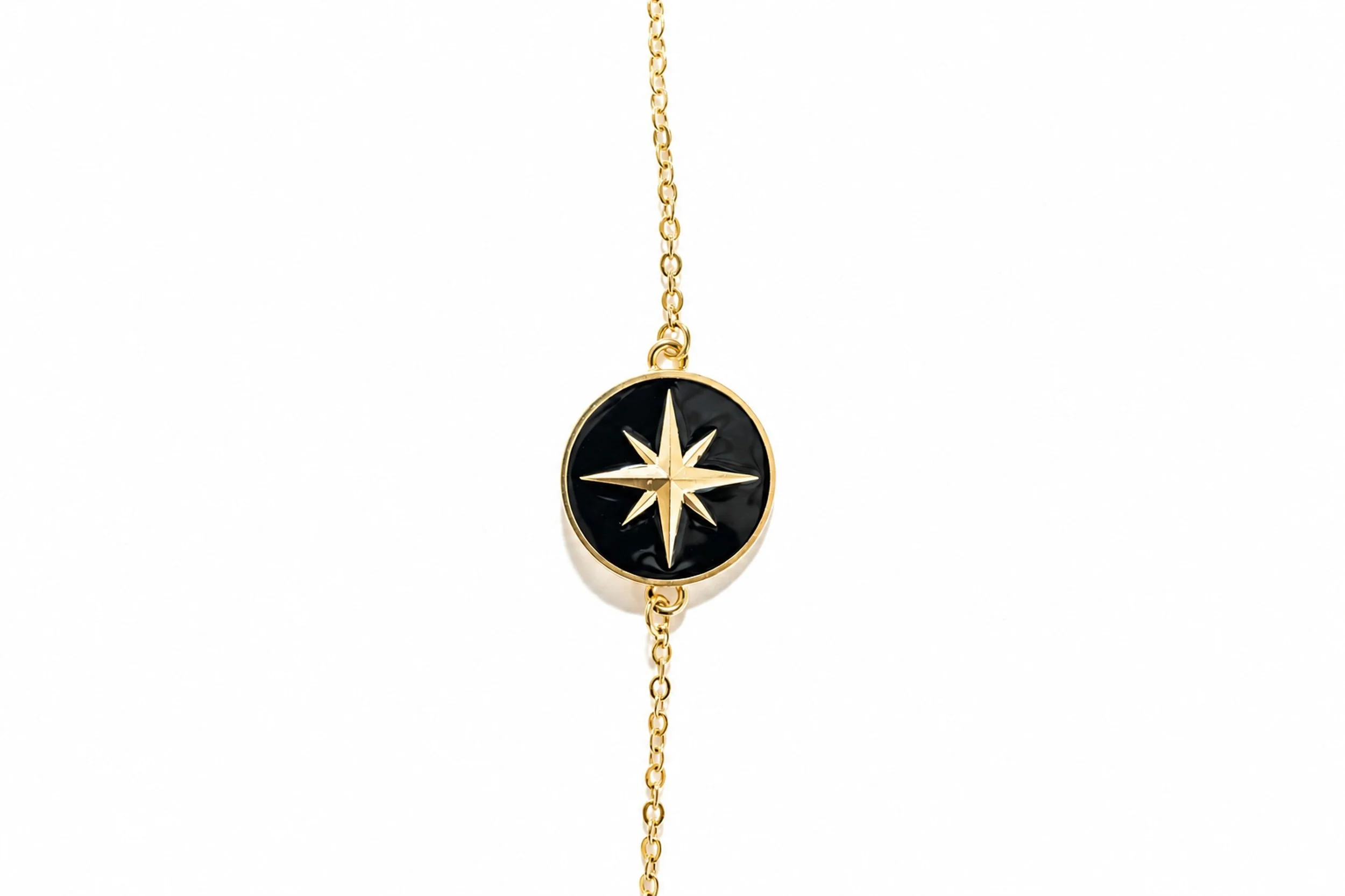 Compass Rose Bracelet, black and gold-enameled brass medallion plated with 24-karat fine gold