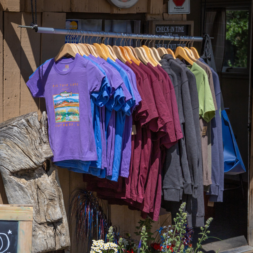 rack+of+merch+2.png