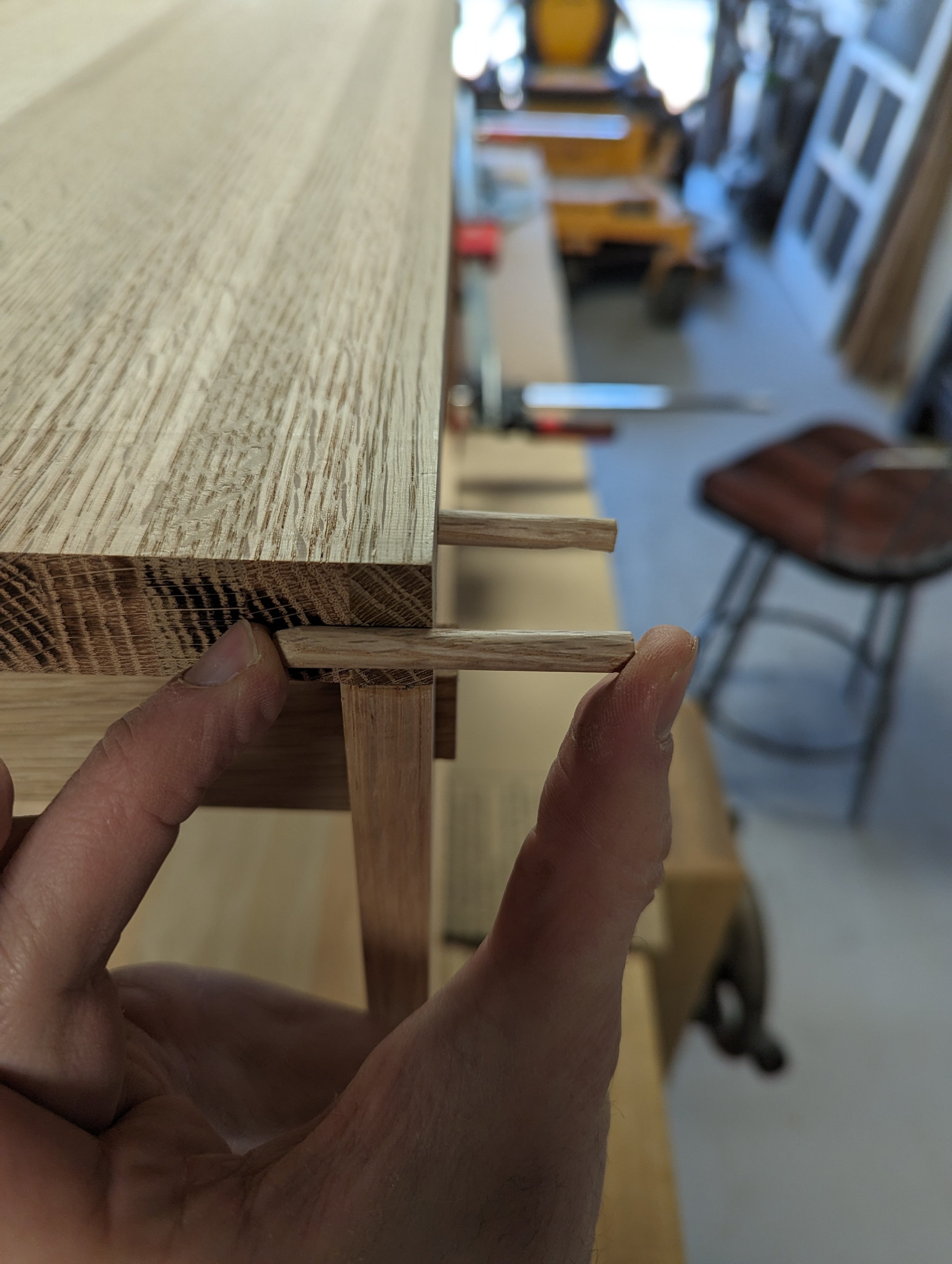  Here’s a comparison of the original dowel length compared to one that was inserted into the table. This provided a good idea of how far each dowel went into the table. 