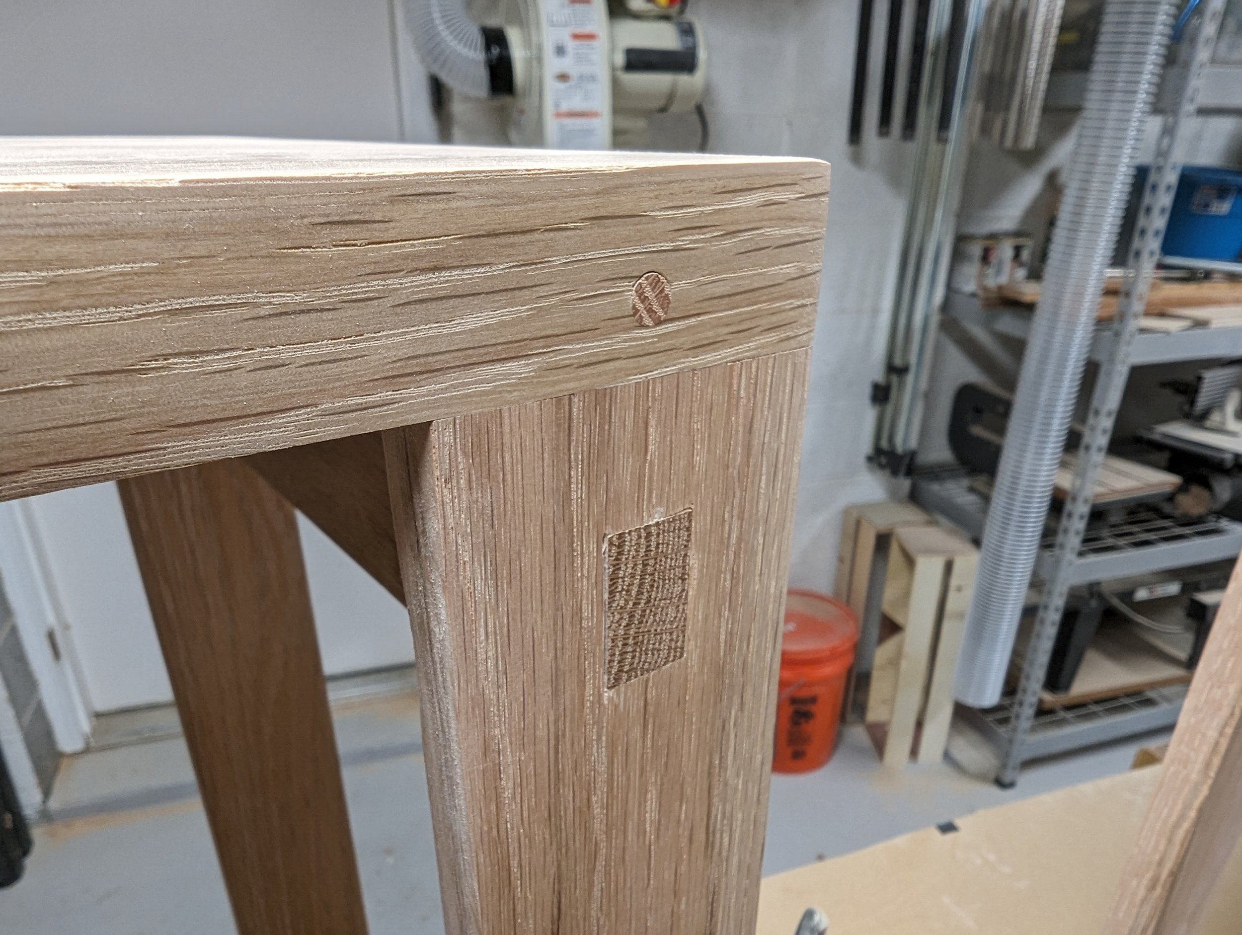  Each dowel and cross member tenon was flush-cut with the table top and leg to provide a smooth surface. 