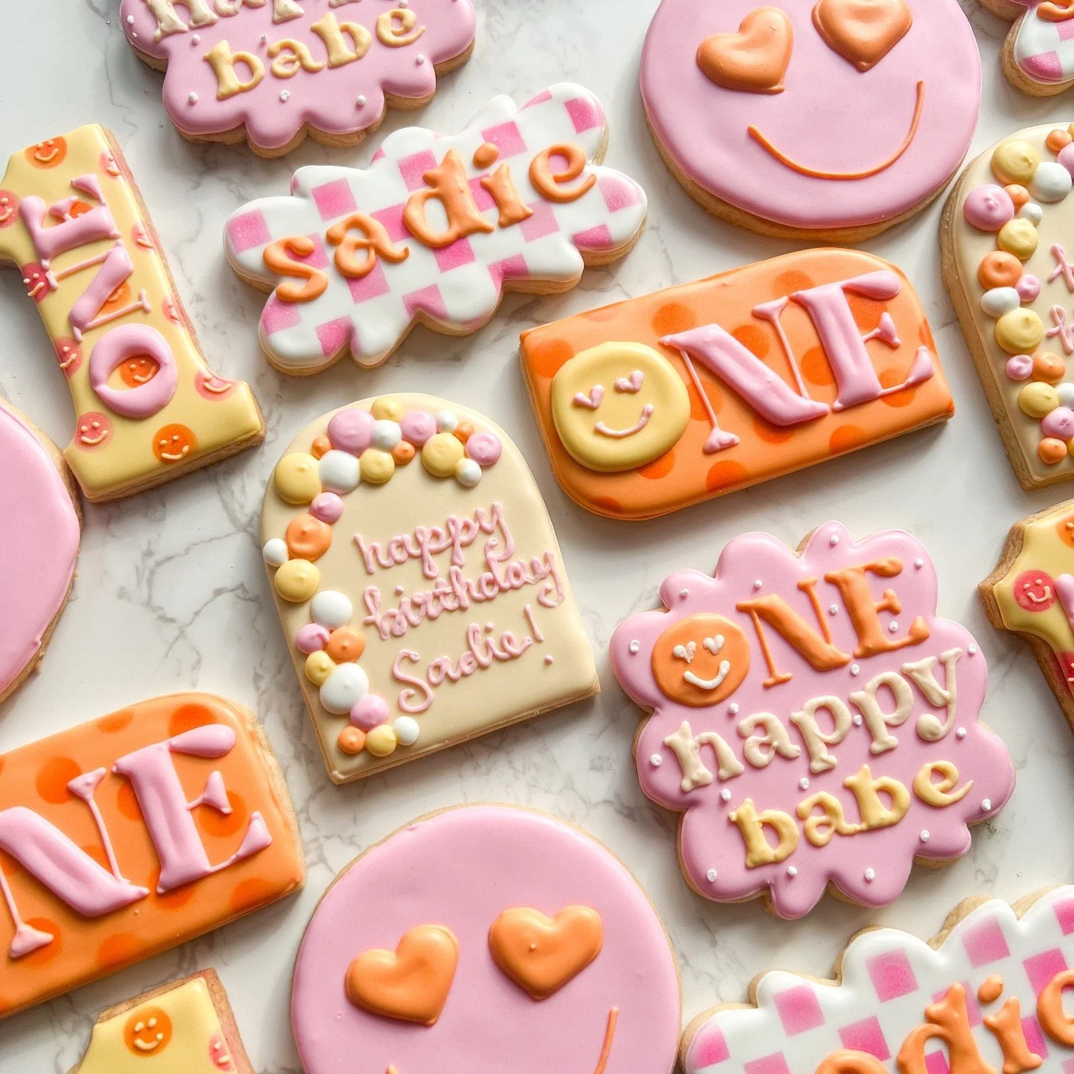 🌈✨ ONE Happy Babe! ✨🌈

Celebrating the sweetest first birthday with these bright + cheerful &ldquo;One Happy Baby&rdquo; sugar cookies! Smiley faces, rainbows, and groovy vibes made this set as joyful as the little one we were honoring 💛😊

Perfec