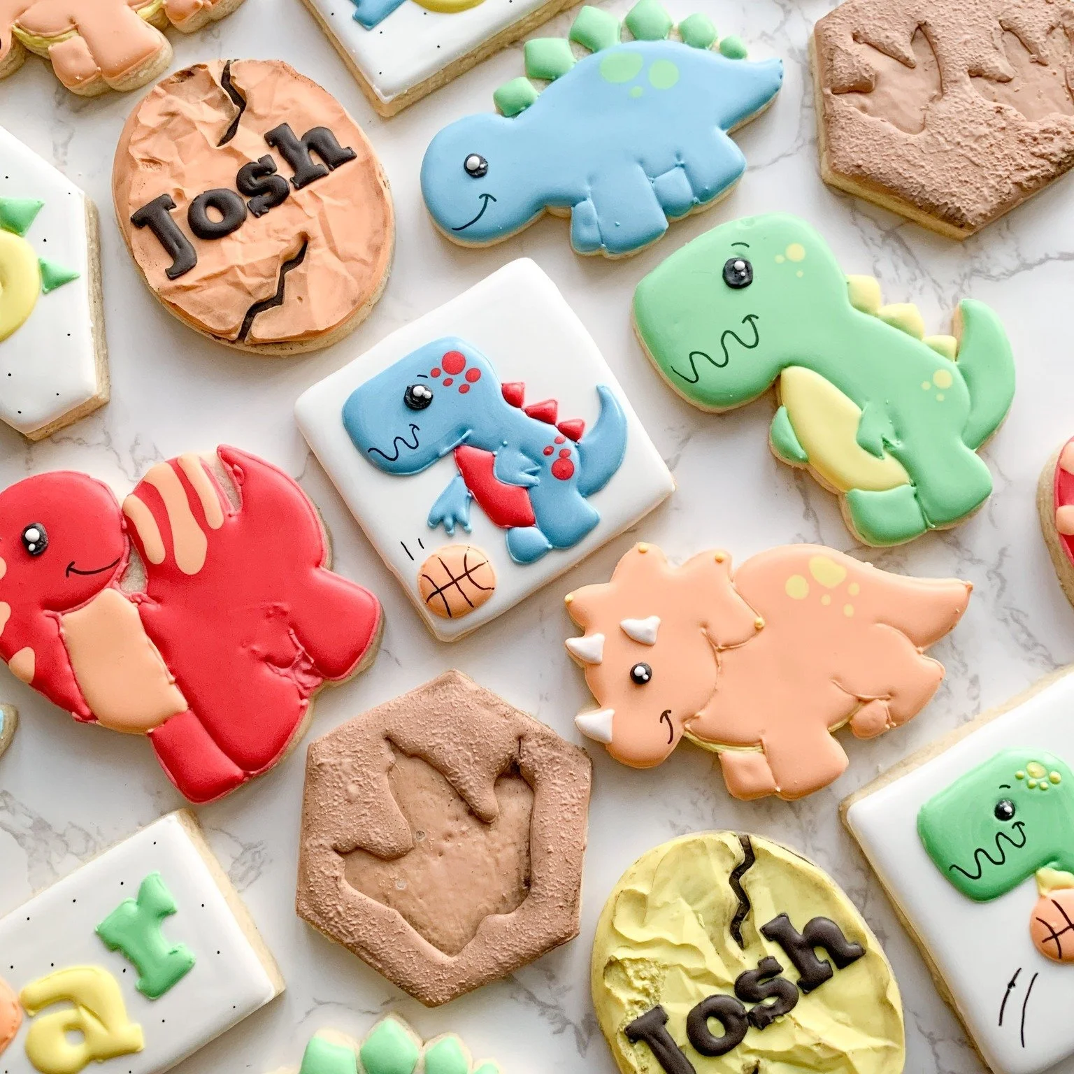 Game on! 🏀🦕 Gimme a theme and I can cookie it!
Dinosaurs + basketball = the ultimate cookie combo. These custom decorated sugar cookies were made for a dino-loving, basketball-obsessed celebration&mdash;and they definitely scored big!
&bull;
#Sweet