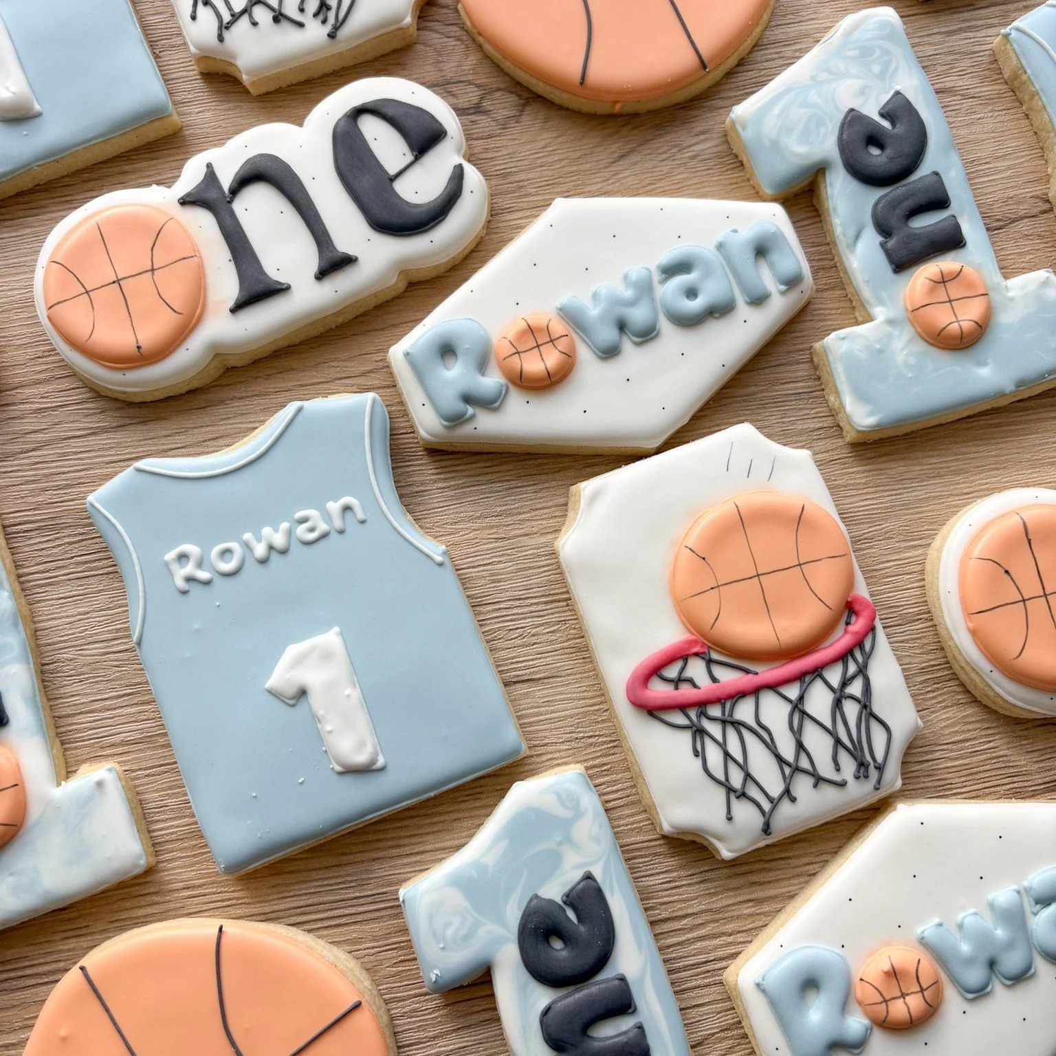 🏀 ONE-derful First Birthday 🧡

Nothing but net for this little rookie&rsquo;s big day! These basketball-themed first birthday cookies are a total slam dunk 🏀✨

From mini jerseys to basketballs and scoreboard-inspired designs, each cookie is custom