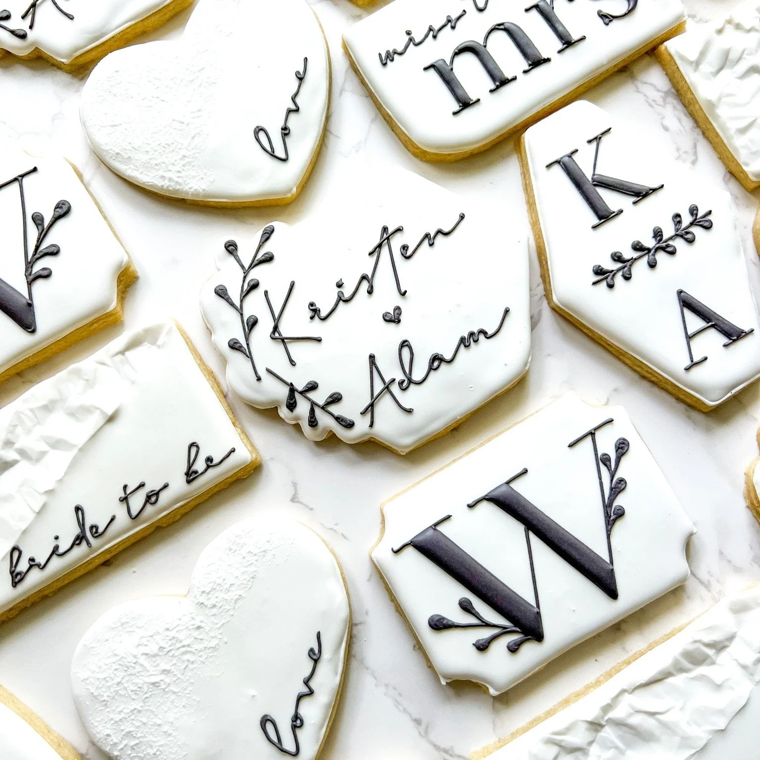 💍✨ Engaged &amp; Glowing ✨🍪

Pop the bubbly and celebrate love in the sweetest way with custom engagement cookies! 💕 From sparkling rings to elegant florals and personalized &ldquo;She Said Yes!&rdquo; details, each cookie is designed to match you